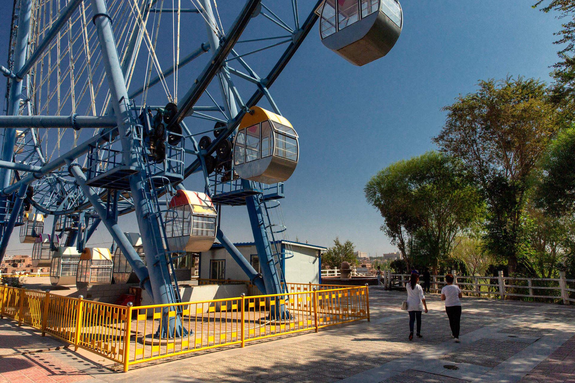 Kashgar,  China - September 10th, 2018 : View of a ferris wheel at a fair in Kashgar