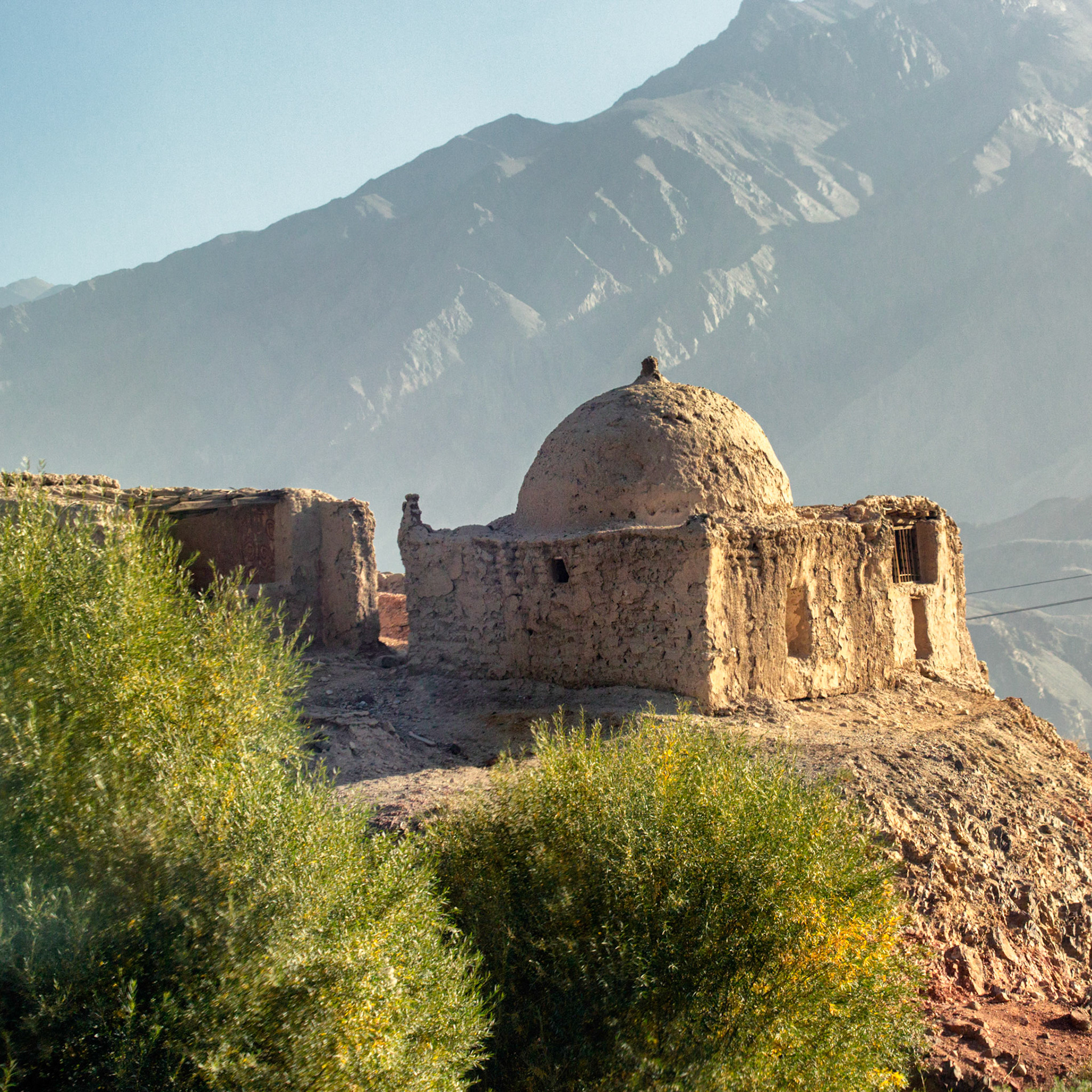 Grave at a muslim graveyard, this type of building is specific to those who have done the pilgrimage to Mekka in their lives