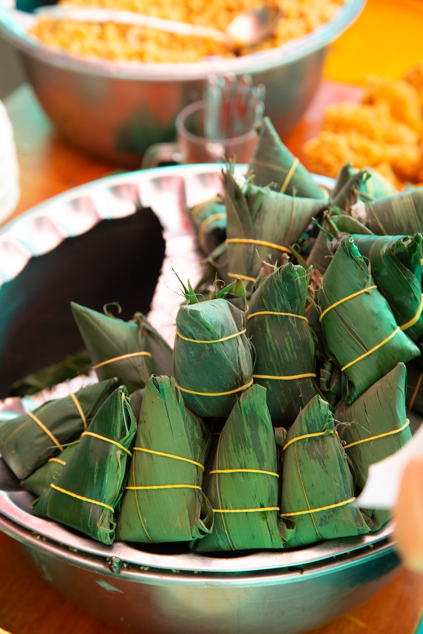 Stack of snackes prepared and wrapped in leaves at the Kashgar Grand Bazaar.