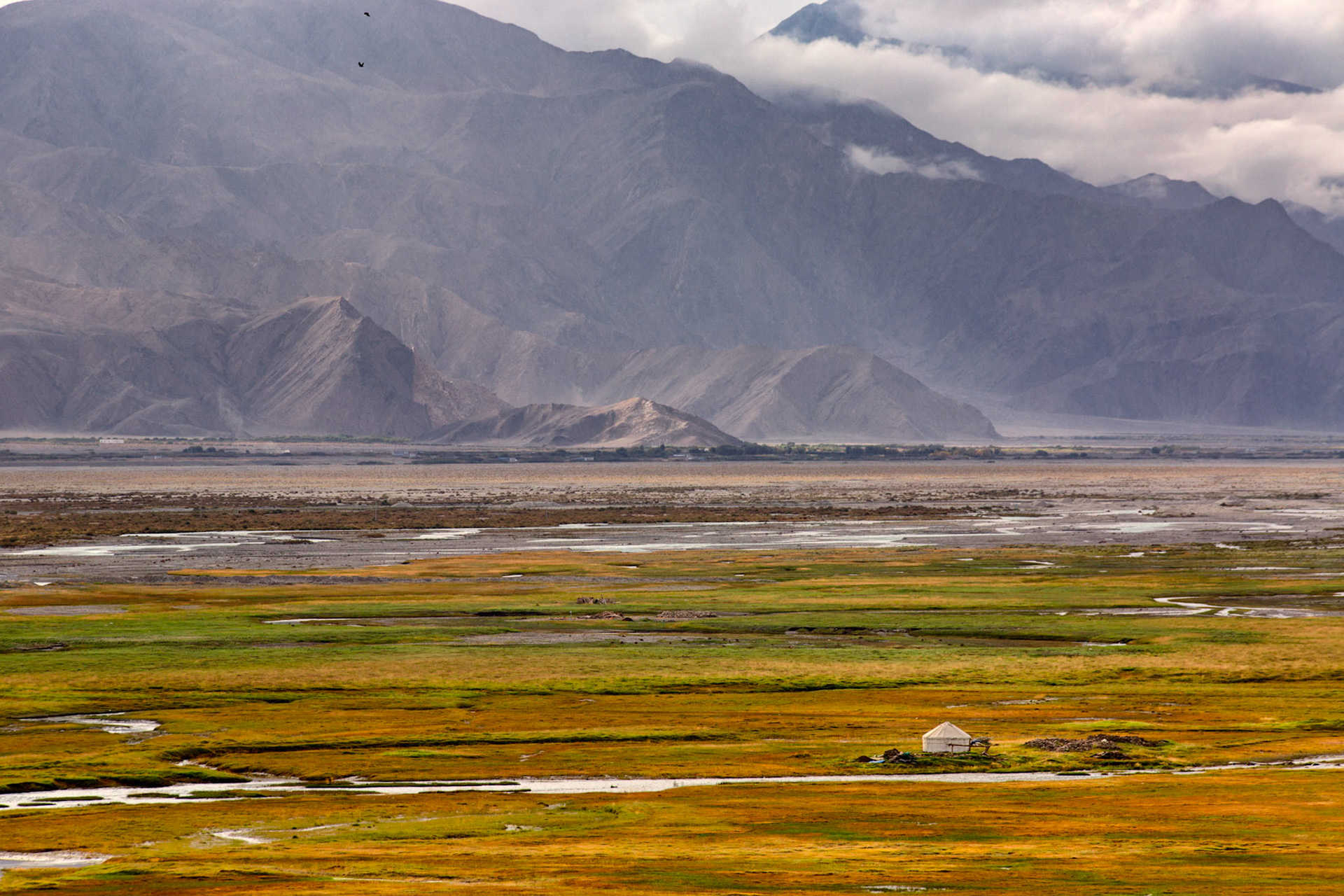 Lone Yurt near a stream in the TTashgurkan grasslands, 3500m altitude, near the China Pakistan border
