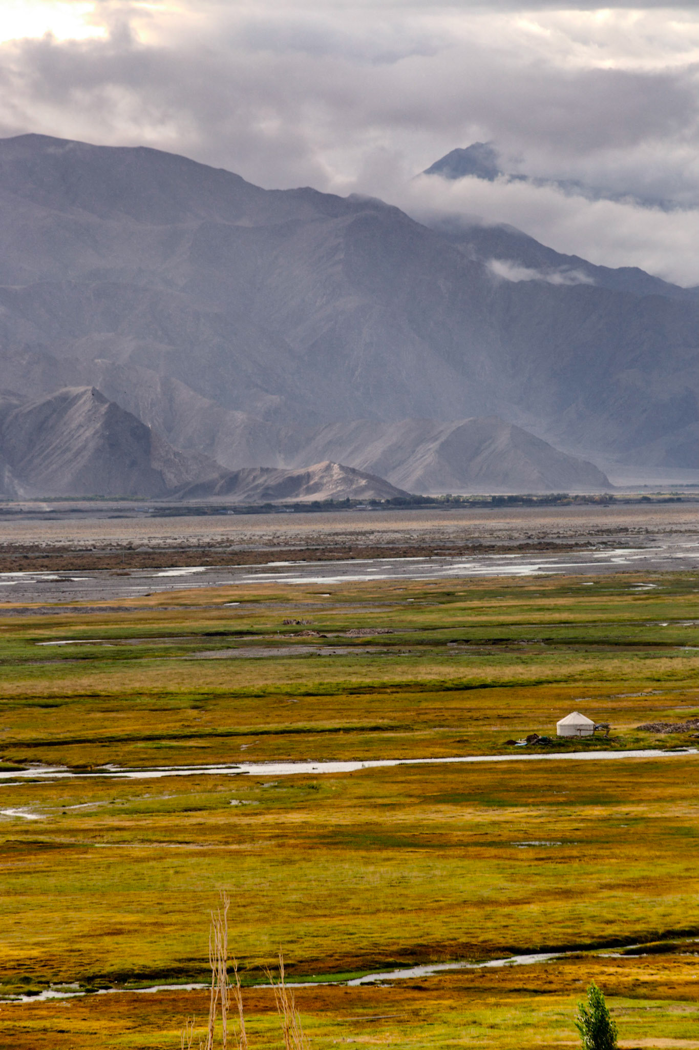 Lone Yurt near a stream in the TTashgurkan grasslands, 3500m altitude, near the China Pakistan border