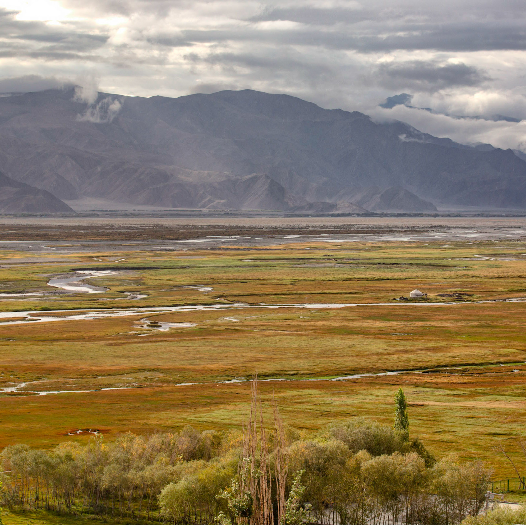 Lone Yurt near a stream in the TTashgurkan grasslands, 3500m altitude, near the China Pakistan border
