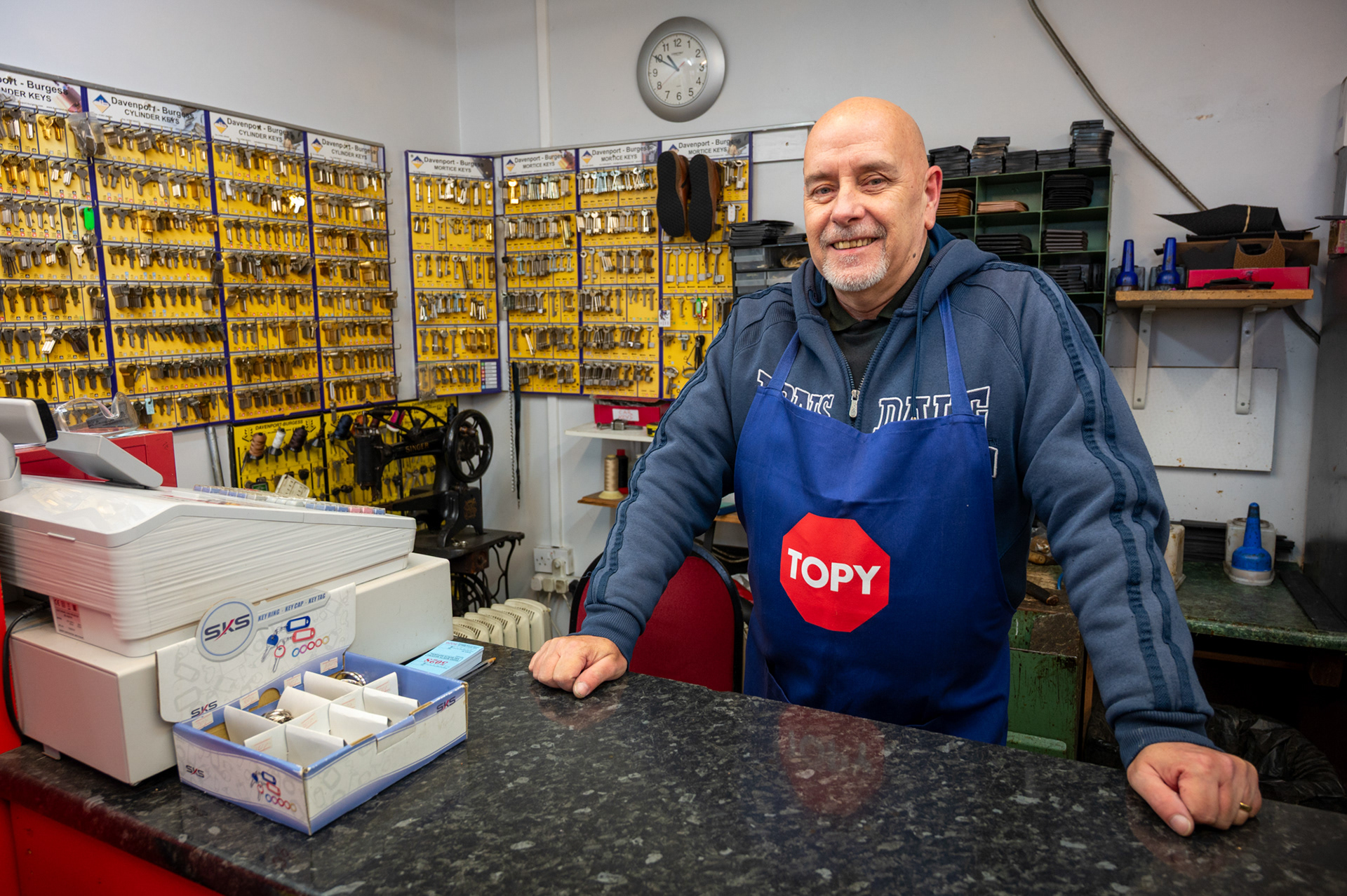 David Ridley of Ridley Shoe Repairs on Blackwoods Hall Street has been a cobbler all his life having learnt the trade working for his father in his home city of London. David came to Blackwood twenty two years ago having married a Blackwood girl, Helen Powell and has run the current business for nine years. The shop has been a cobblers for many years, certainly since the 1950’s and probably long before that.