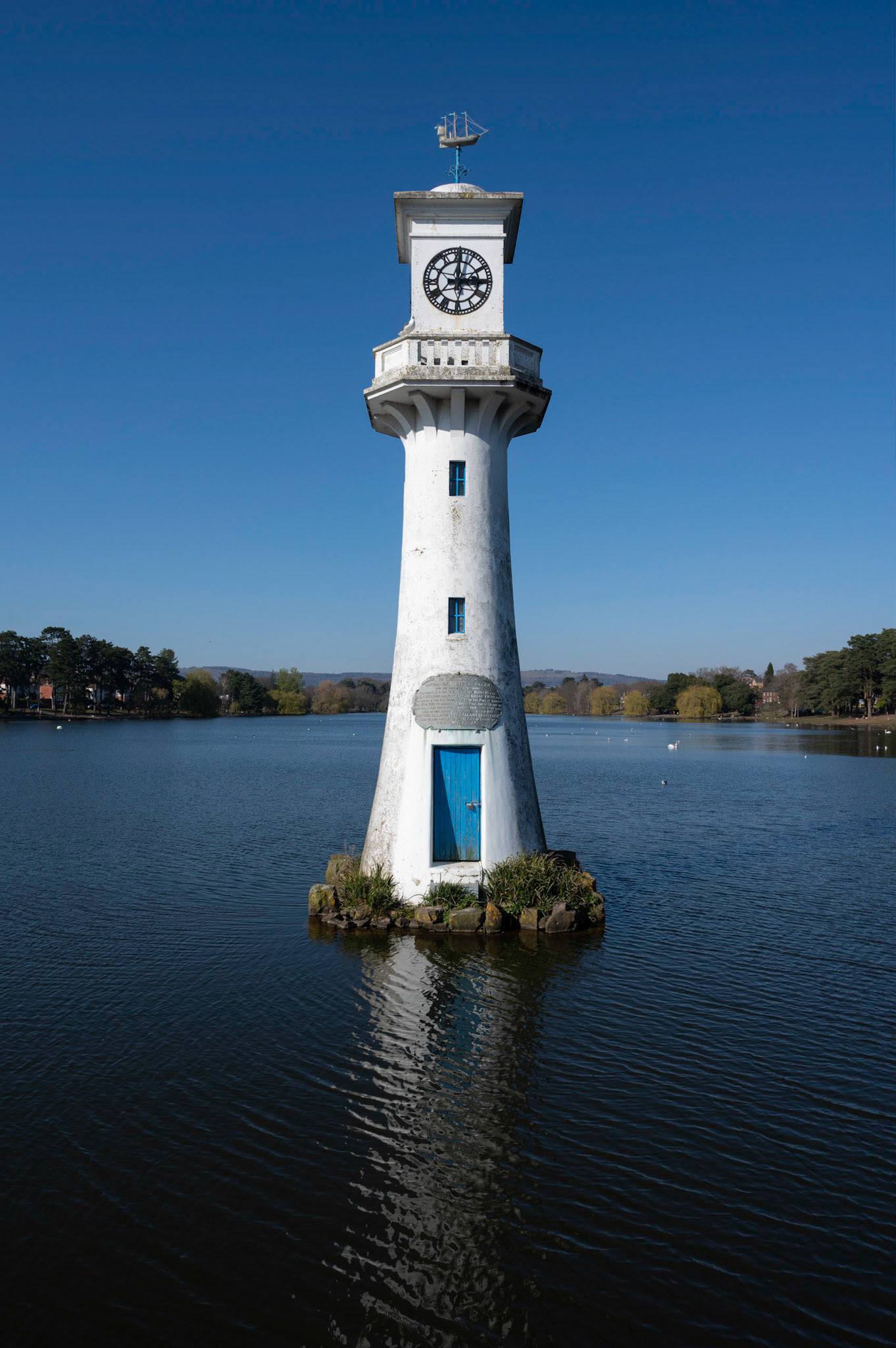 The Scott monument clock tower at Roath Park, Cardiff under a blue sky during the coronavirus pandemic, 25/3/20.