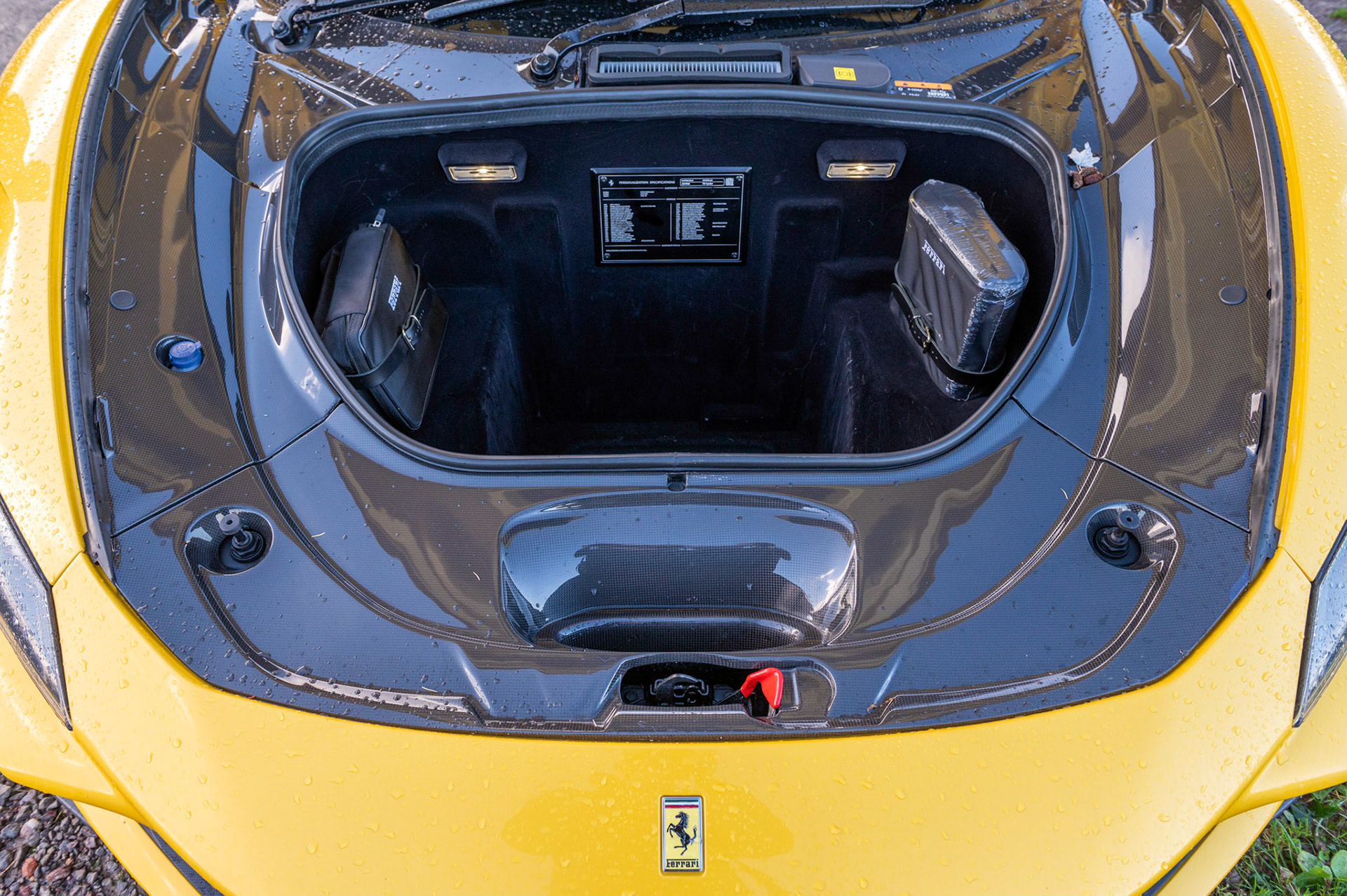 Yellow Ferrari F8 Spider photographed on the Gwent Levels, Castleton, South Wales, UK.