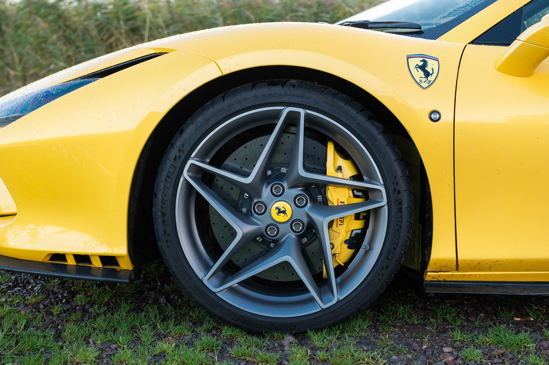 Yellow Ferrari F8 Spider photographed on the Gwent Levels, Castleton, South Wales, UK.