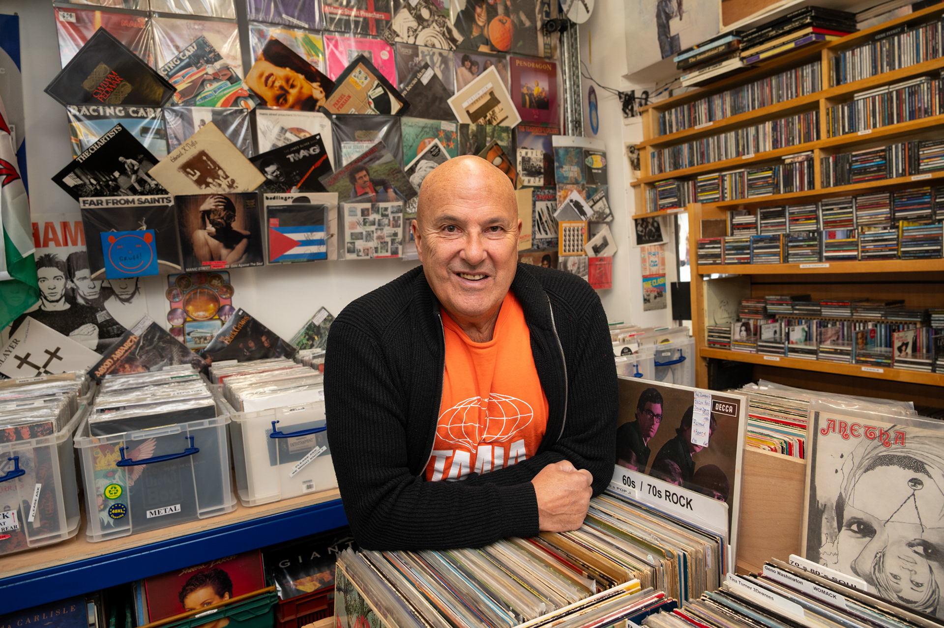 Al Kent, owner of Heart of The Valleys Records in Blackwood Market Place where he has been selling vinyl records for the past four and half years after previously trading in Blackwood for eleven years. Always a great sound emanates from the shop door as you walk past evoking times gone by as old but familiar tunes drift out. 13/9/25.