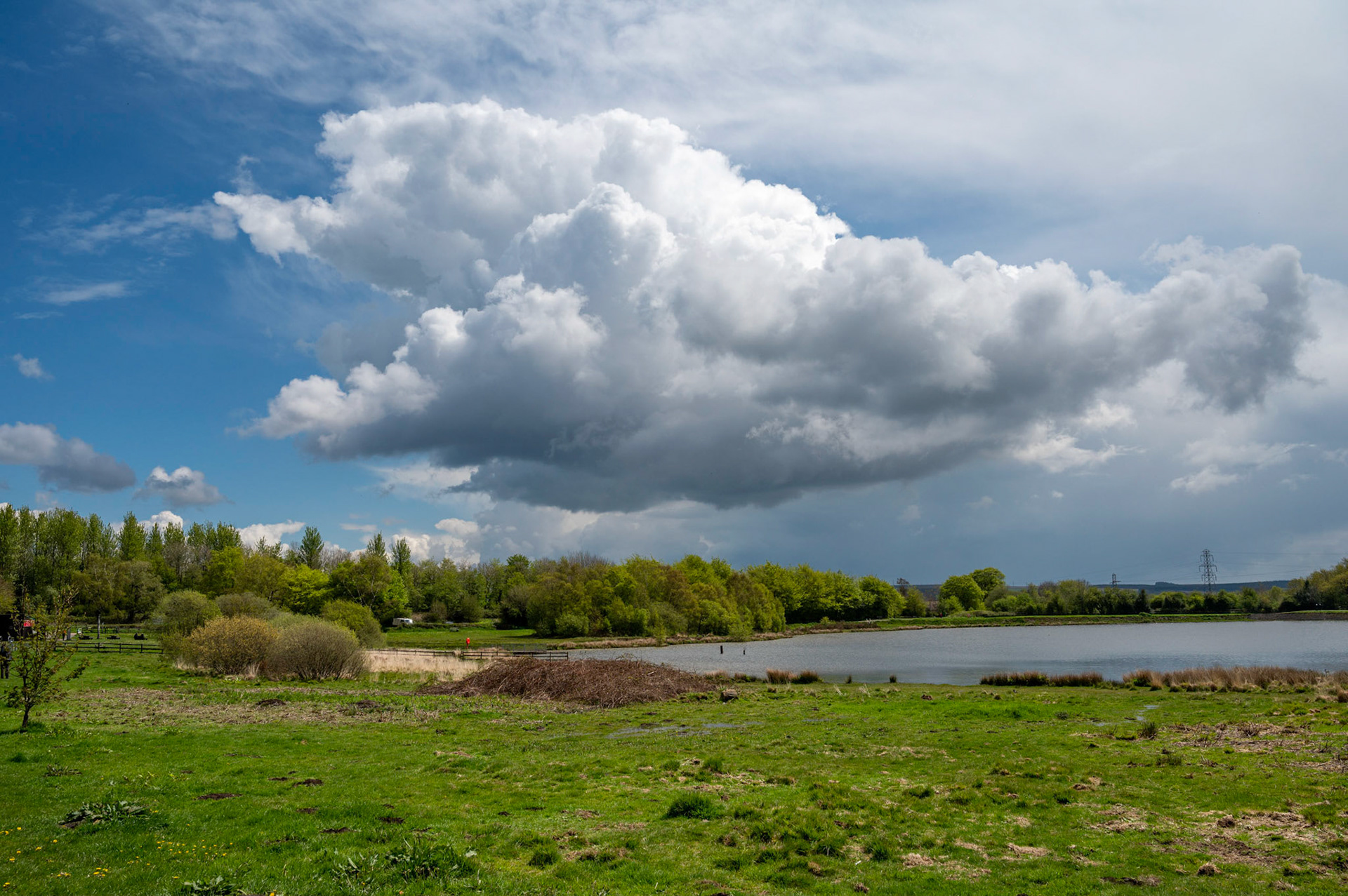 Rain clouds over Penyfan Pond, near Blackwood, South Wales