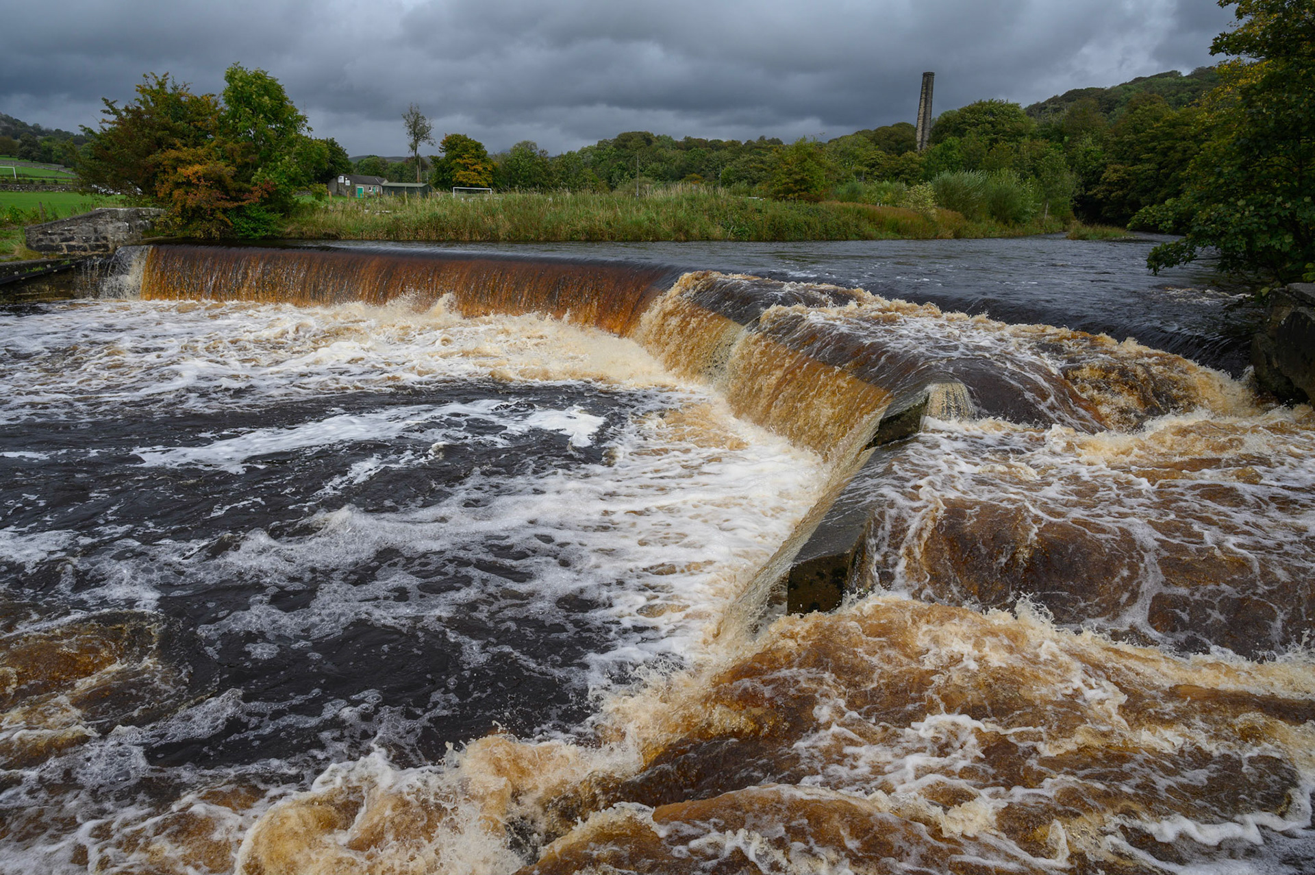 The River Ribble in full flow at Settle, North Yorkshire.