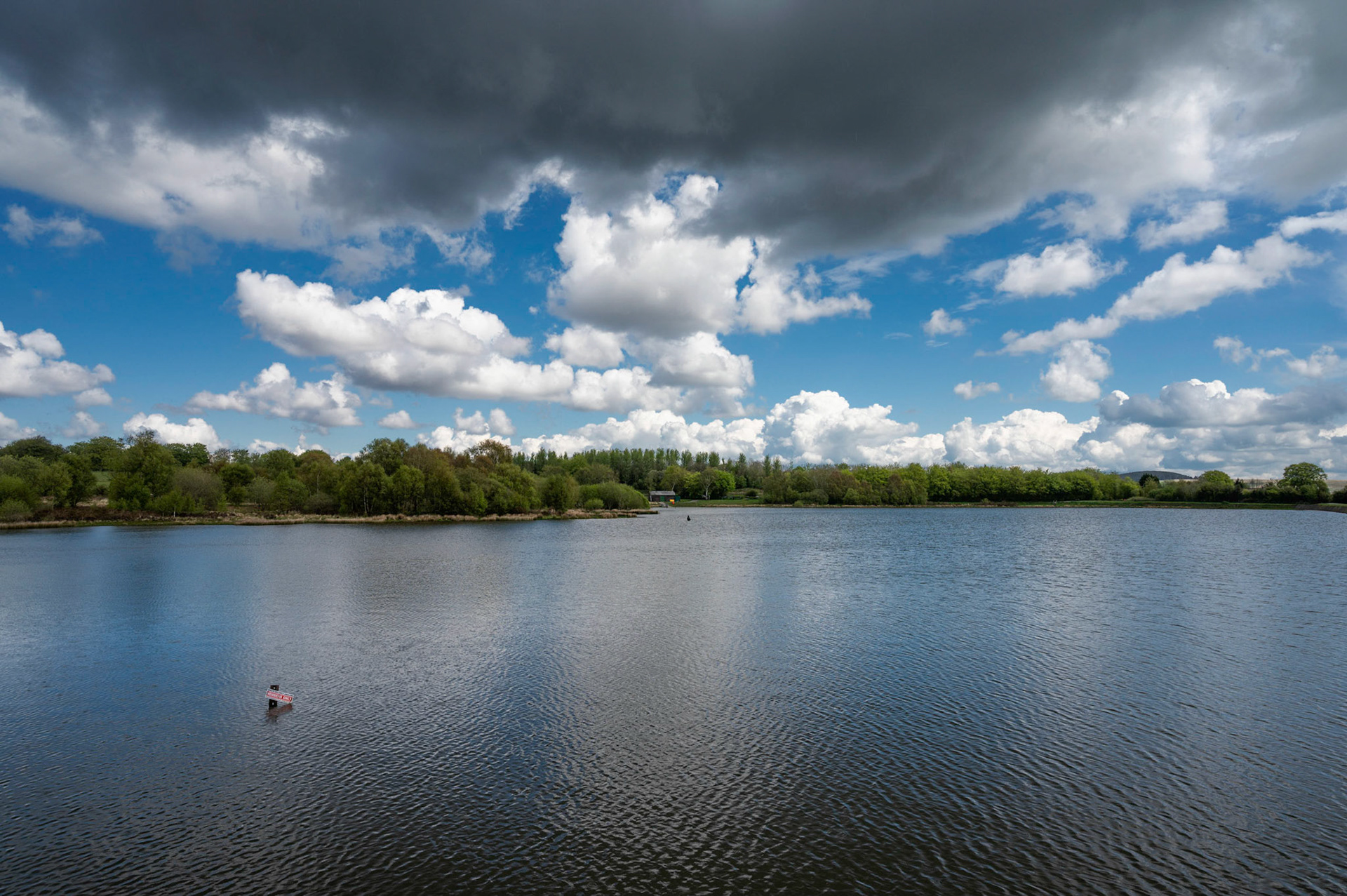Rain clouds over Penyfan Pond, near Blackwood, South Wales