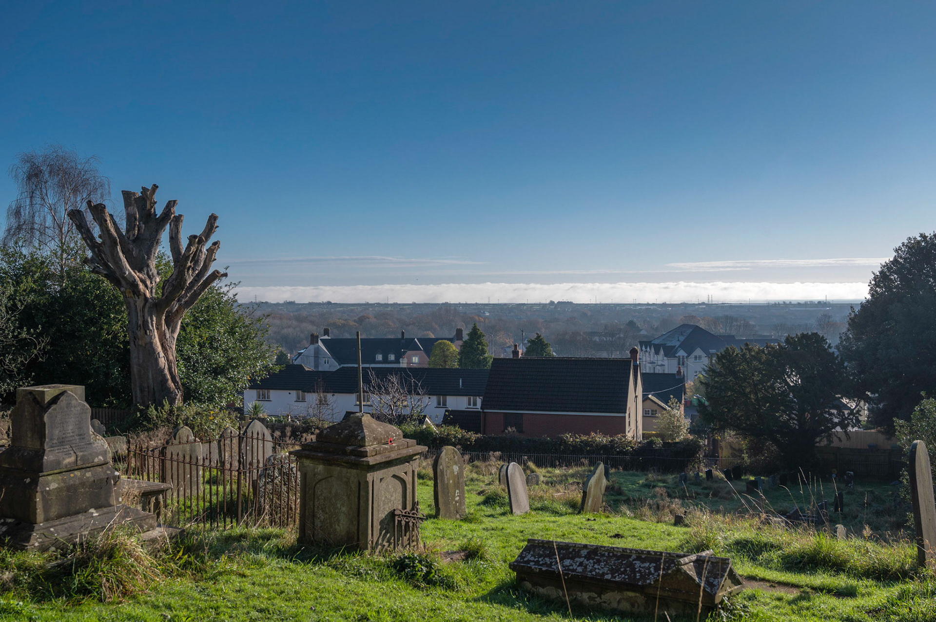 Fog bank over The River Severn looking south from St Mellons Church, Cardiff.