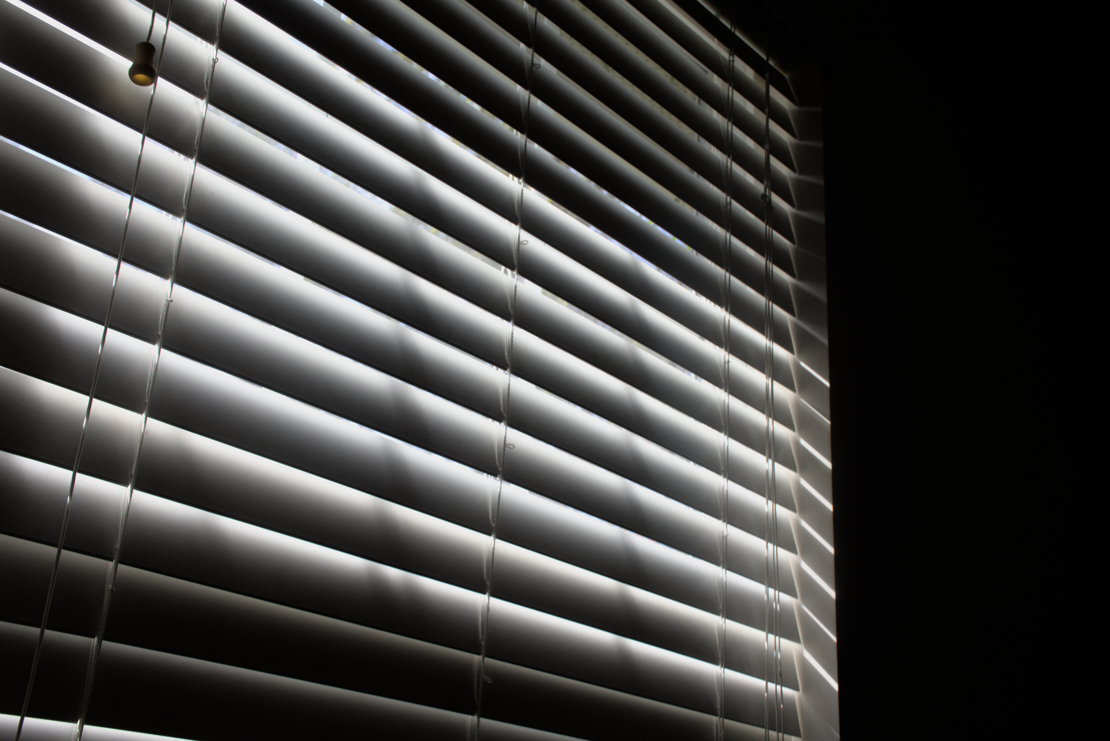 Original photo of a window in a dark room