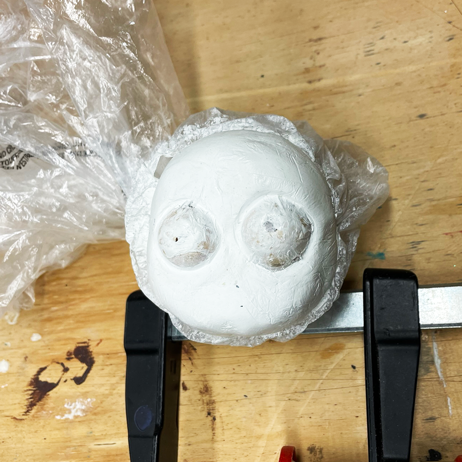 Epoxy clay sculpt on top of backplate