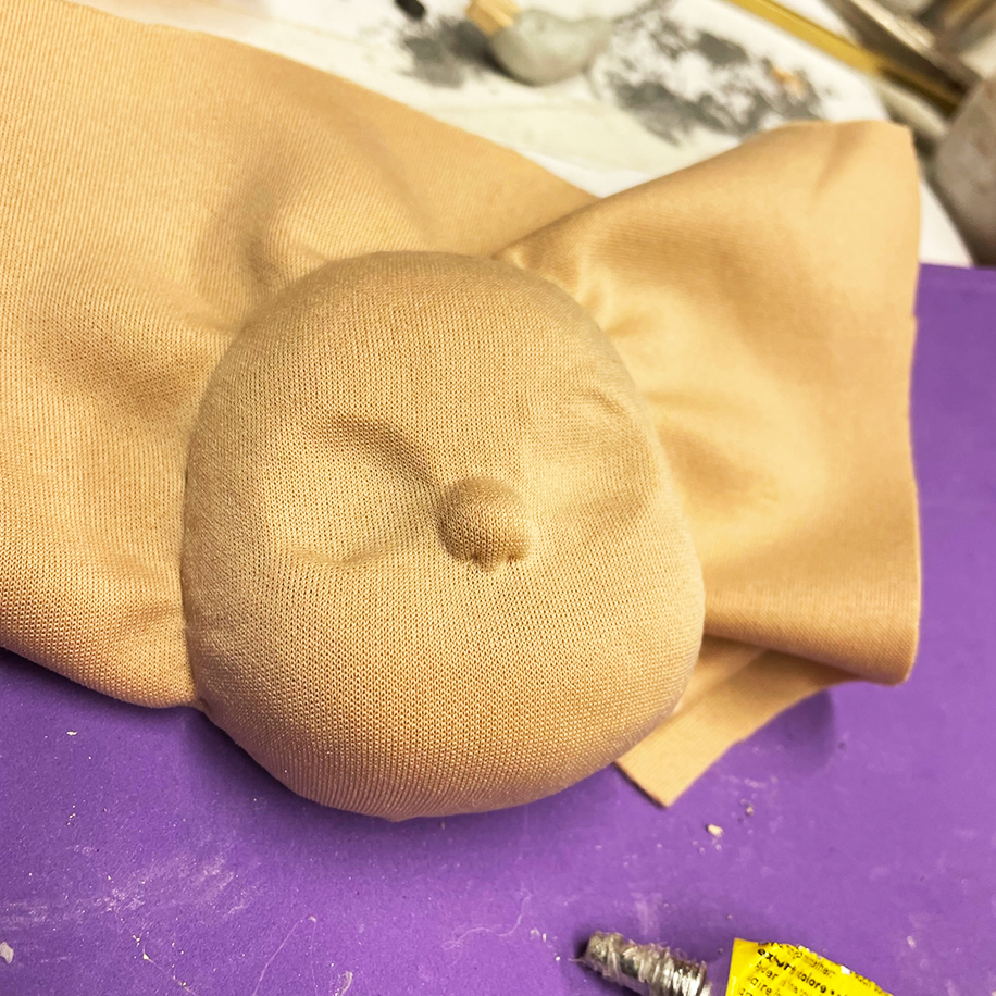 Fabric stretched over face plate