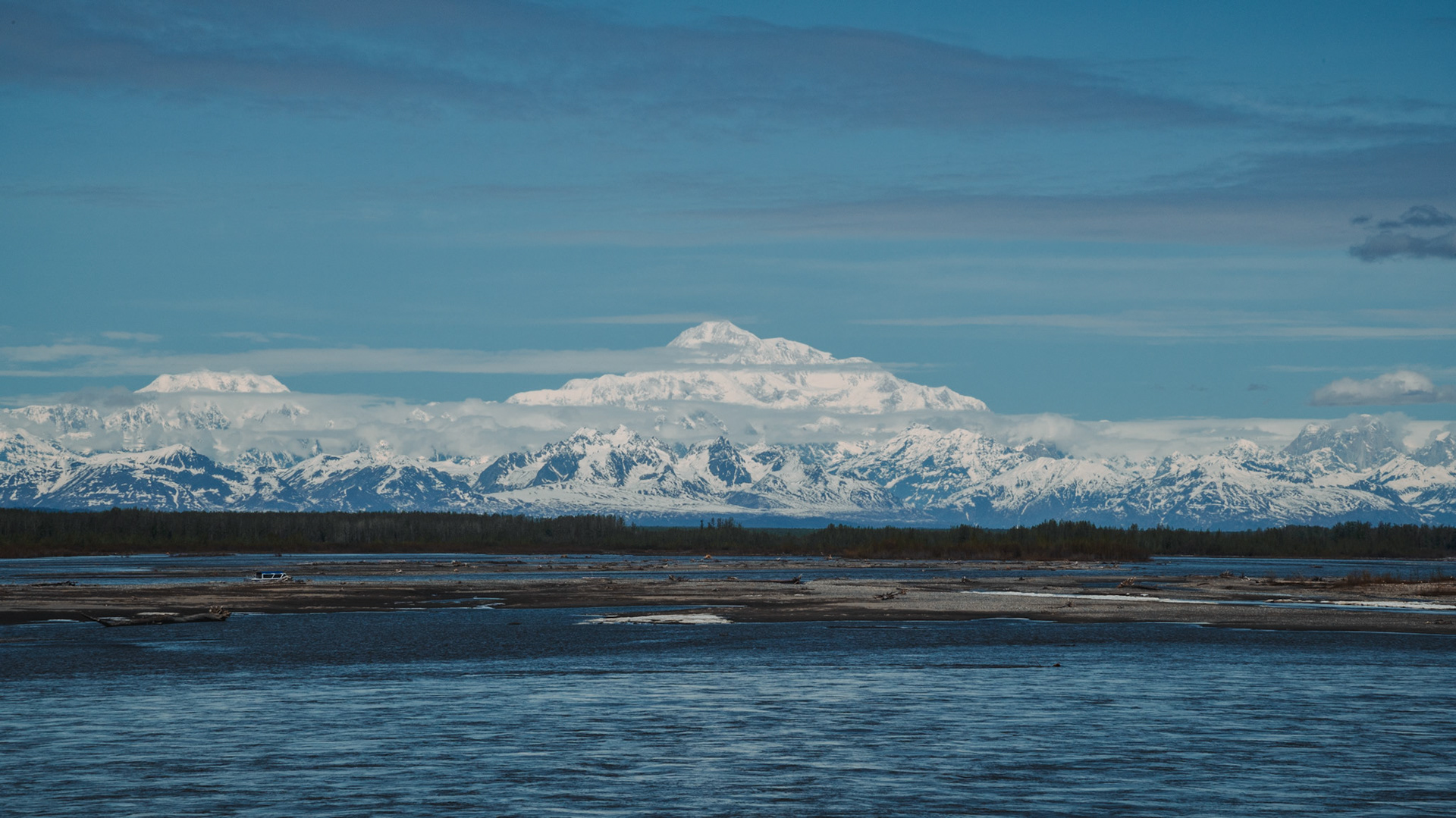 Mt. McKinley - Denali Peak visible above the clouds