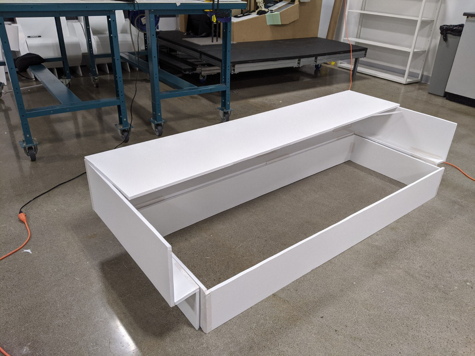 Foamcore was used to mock up the dimensions of the proposed massage table monument.