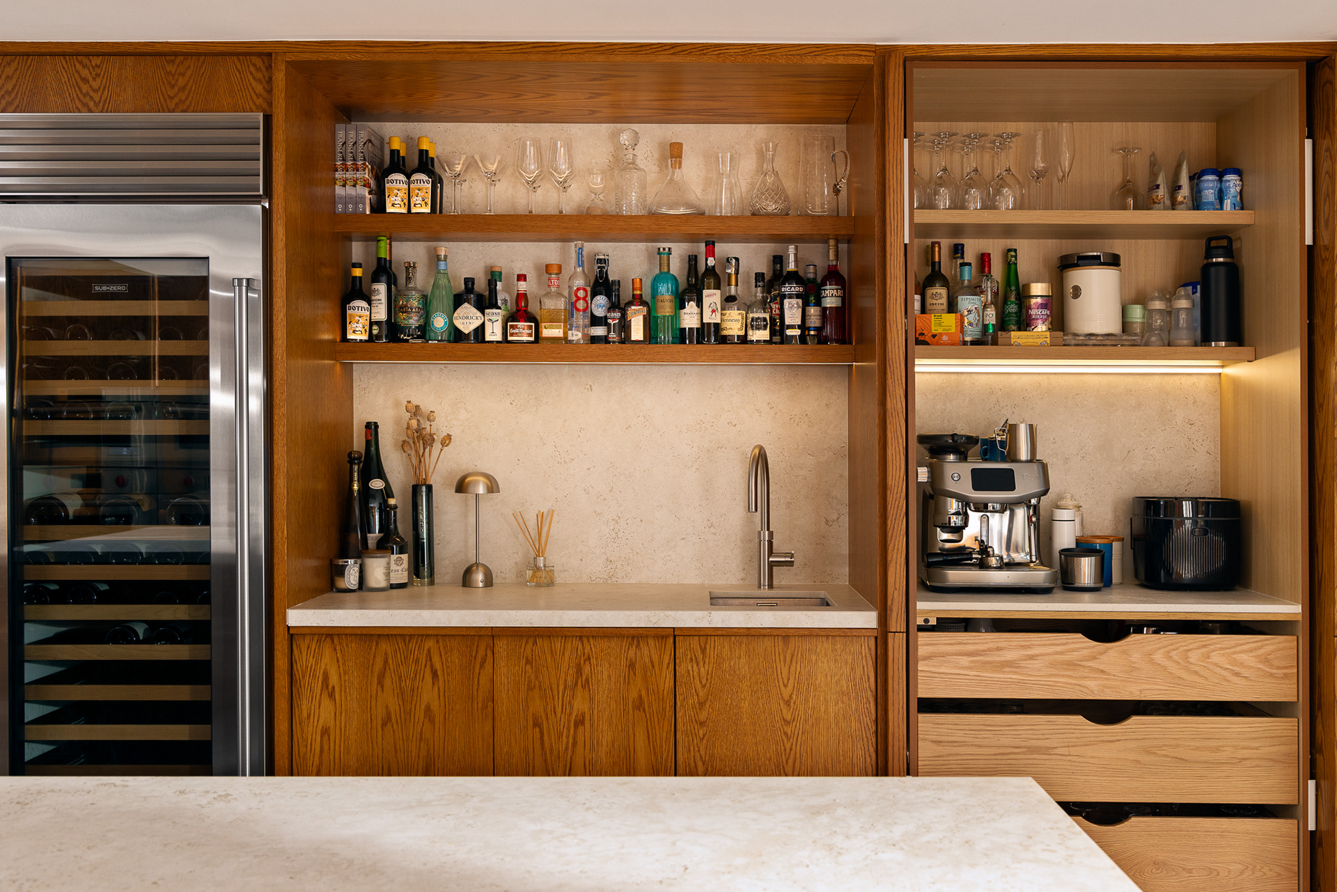 A seamless blend of handcrafted joinery and Sub-Zero refrigeration, designed for both everyday living and entertaining.