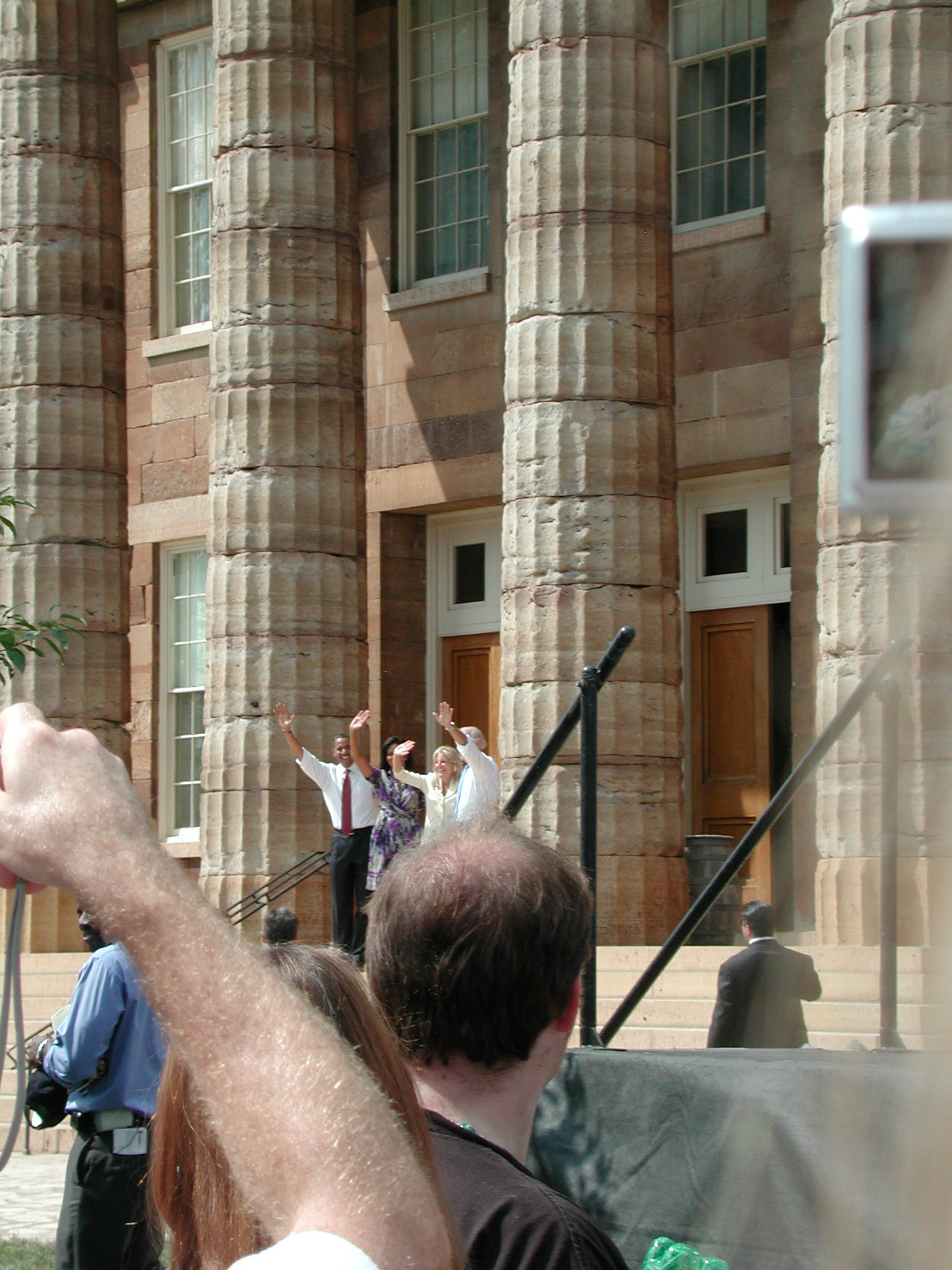 The Obamas and the Bidens wave goodbye to the crowd