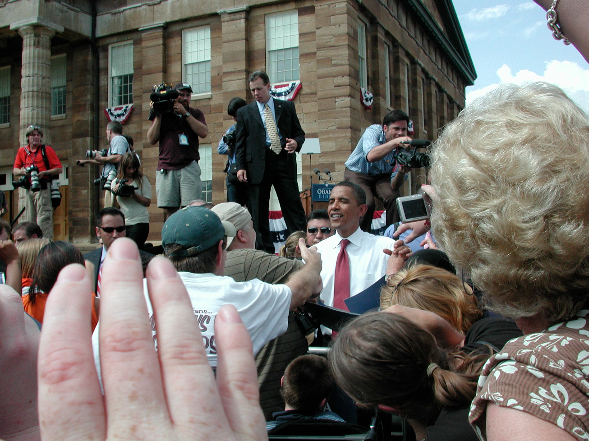 Obama shakes hands with the participants