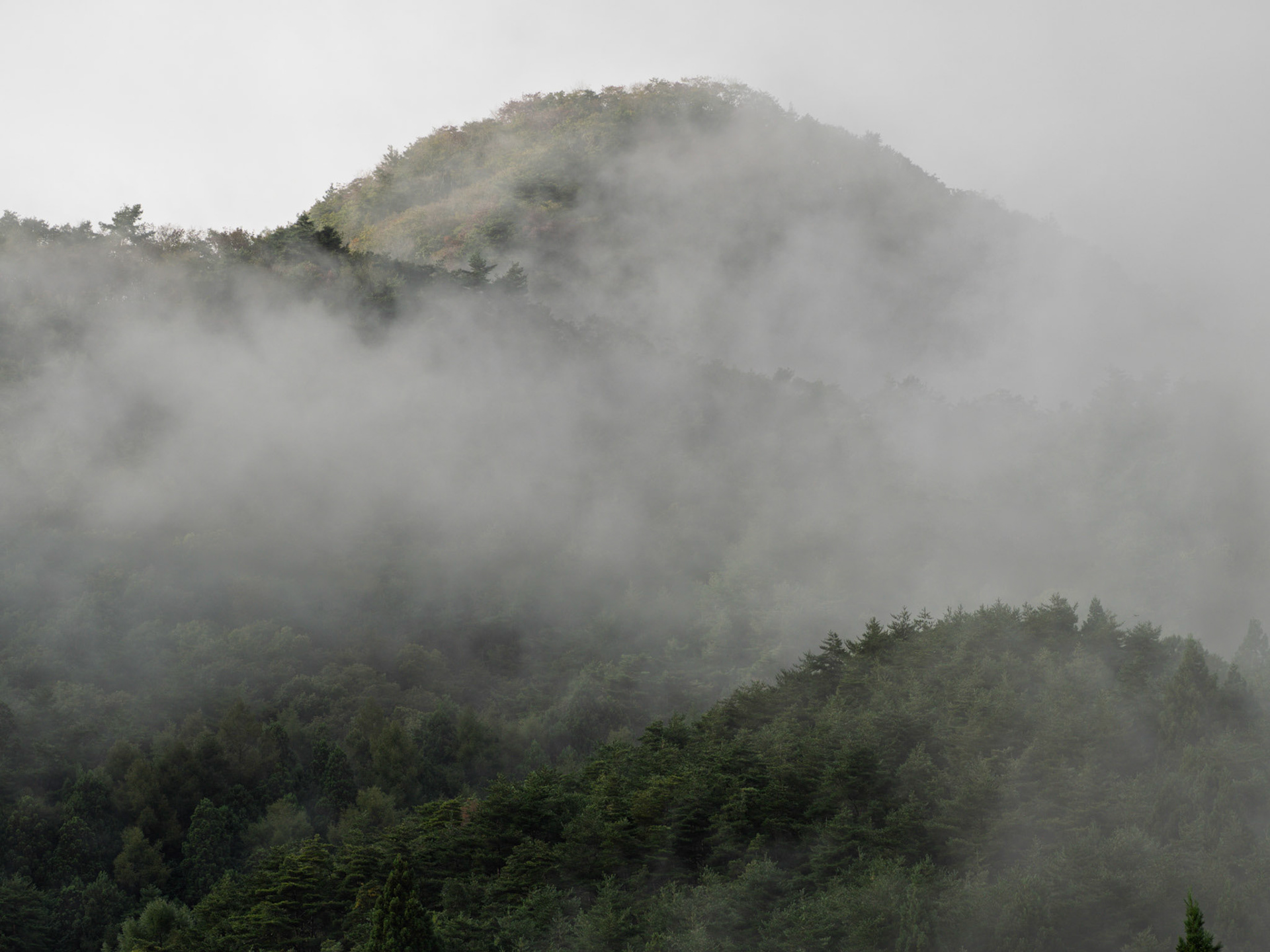 Clouds moving through the 5 Lakes hills