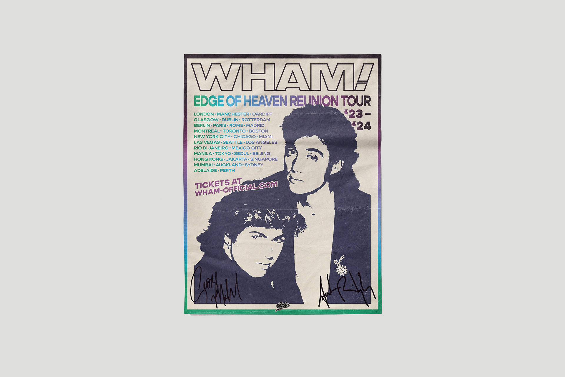Wham! branded 80s tour poster on grey wall.