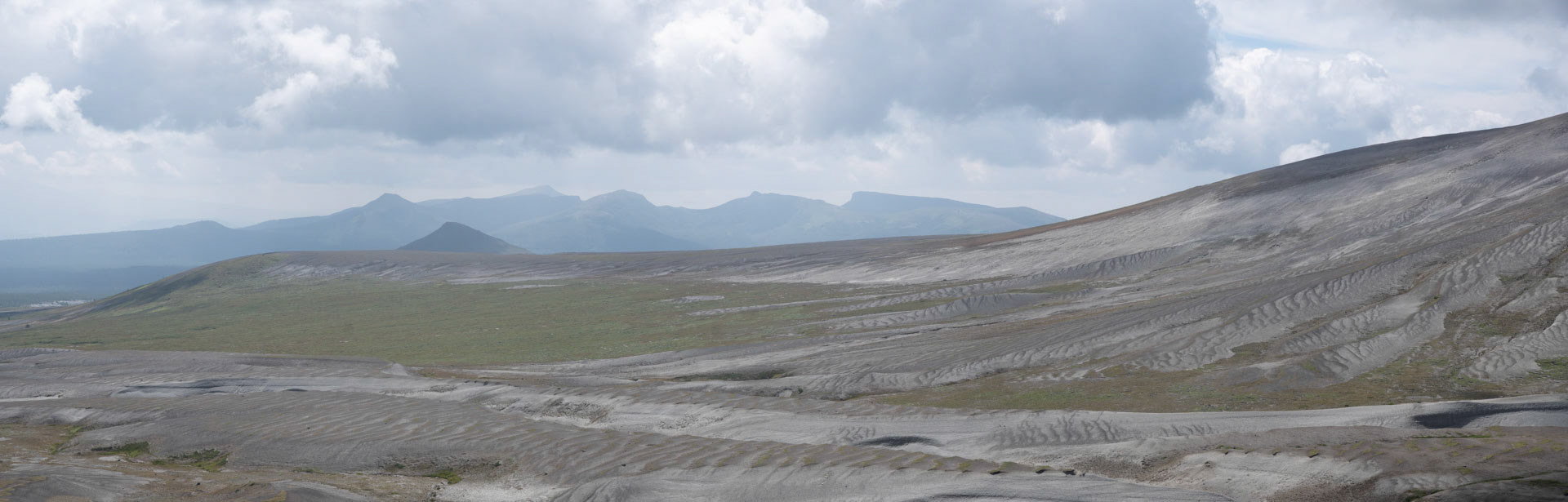 Soyeonji-bong in the foreground with the Ganbaek-san ridge in background on the Paektu plateau, DPRK (2017). 