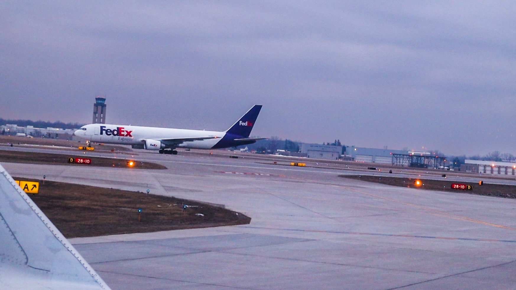 FedEx 767 (FX1528 / N138FE) on ground in ROC