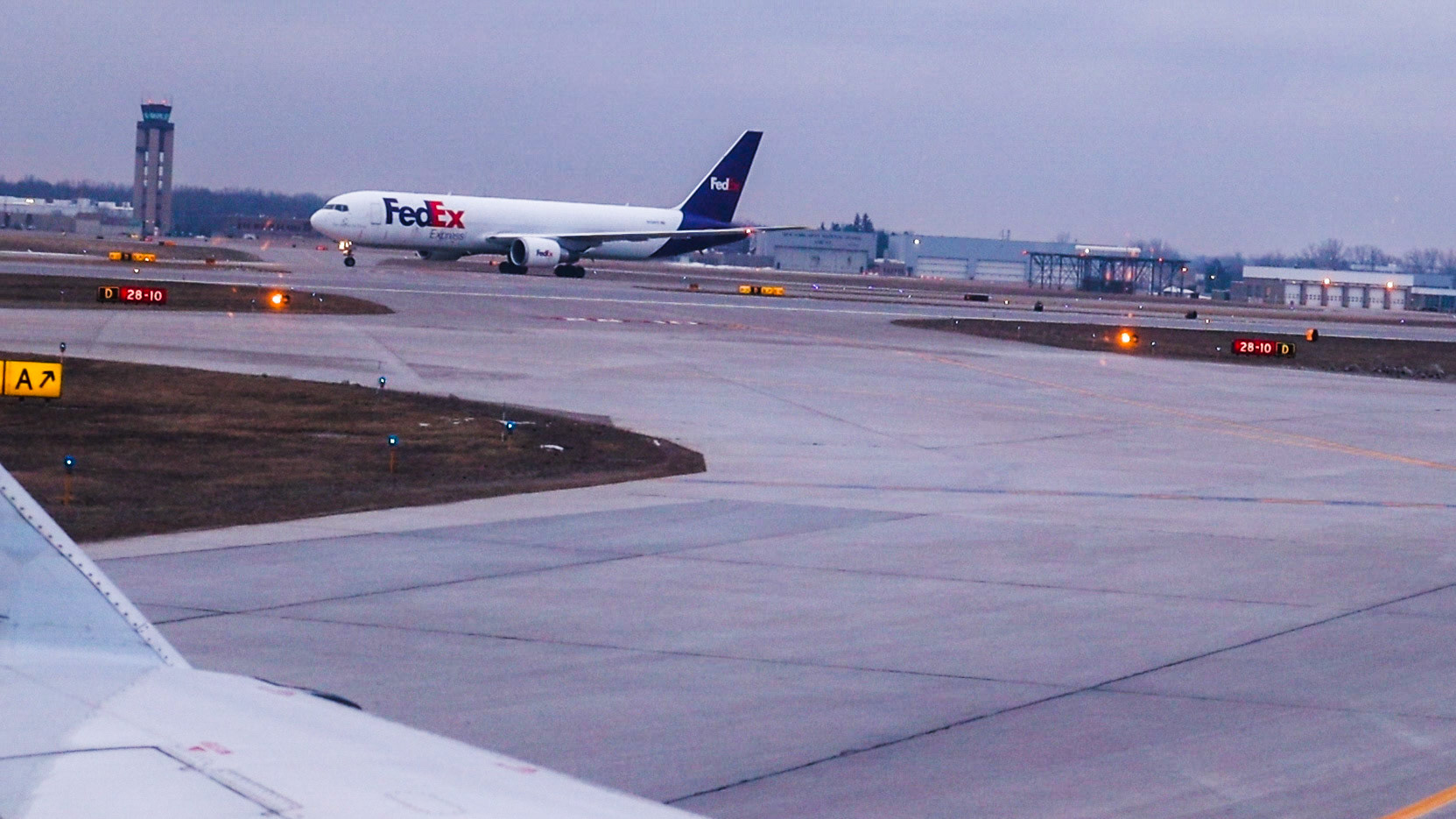 FedEx 767 (FX1528 / N138FE) on ground in ROC