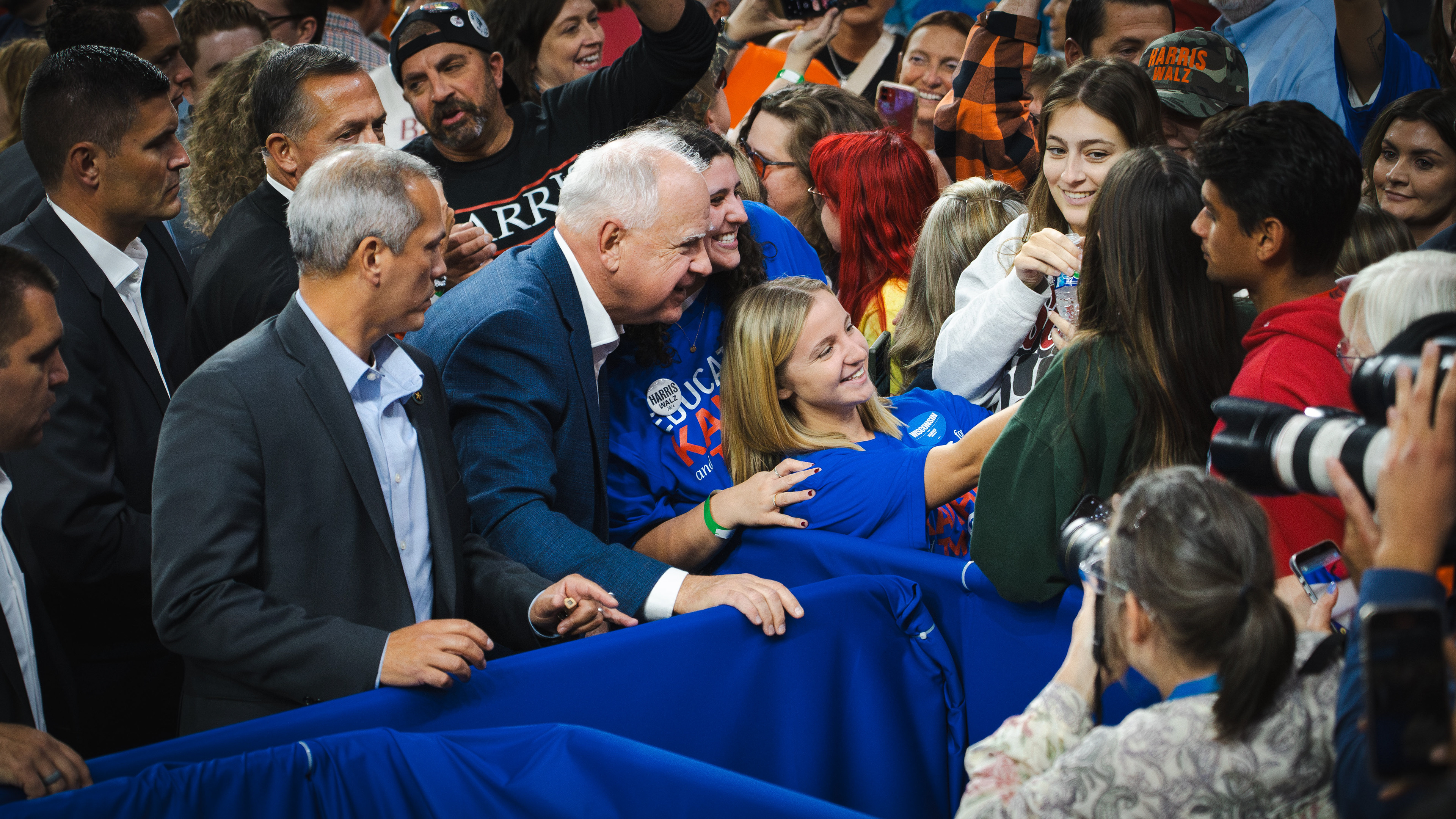 Governor Tim Walz greets supporter after rally in Madison, WI. October 2024