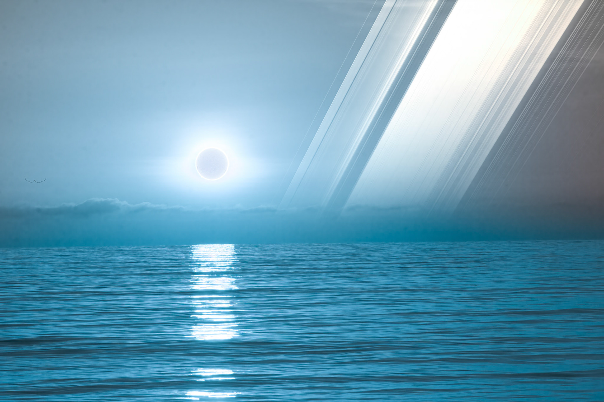 Ringed ocean planet orbiting a hot blue star.