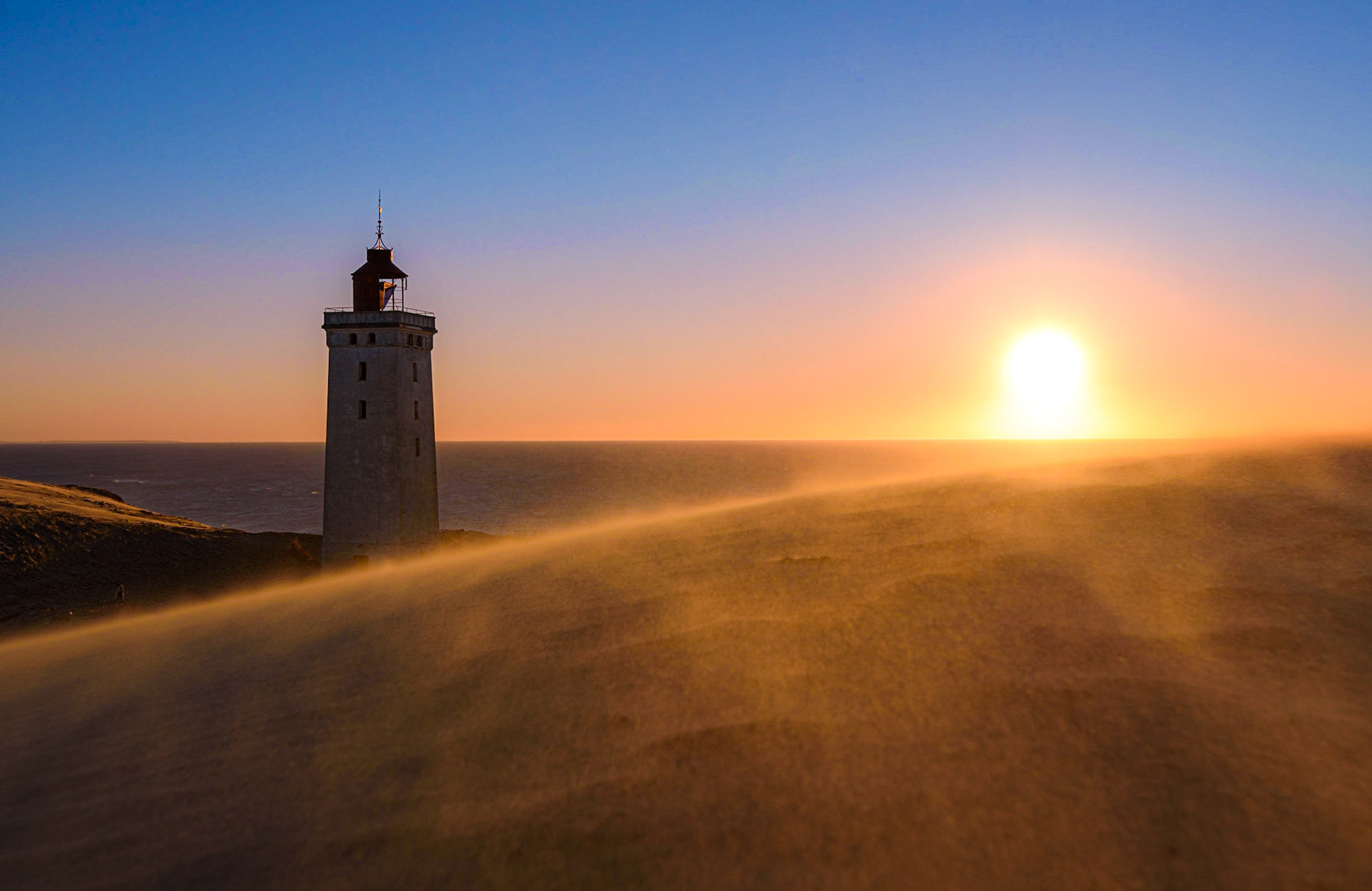 Windy conditions at Rubjerg Knude lighthouse in Denmark.