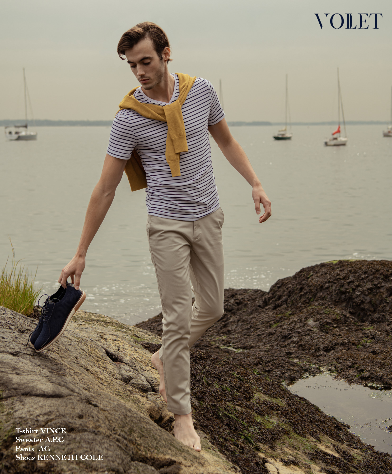 Model Levi Comer walks by the sound in Larchmont, New York