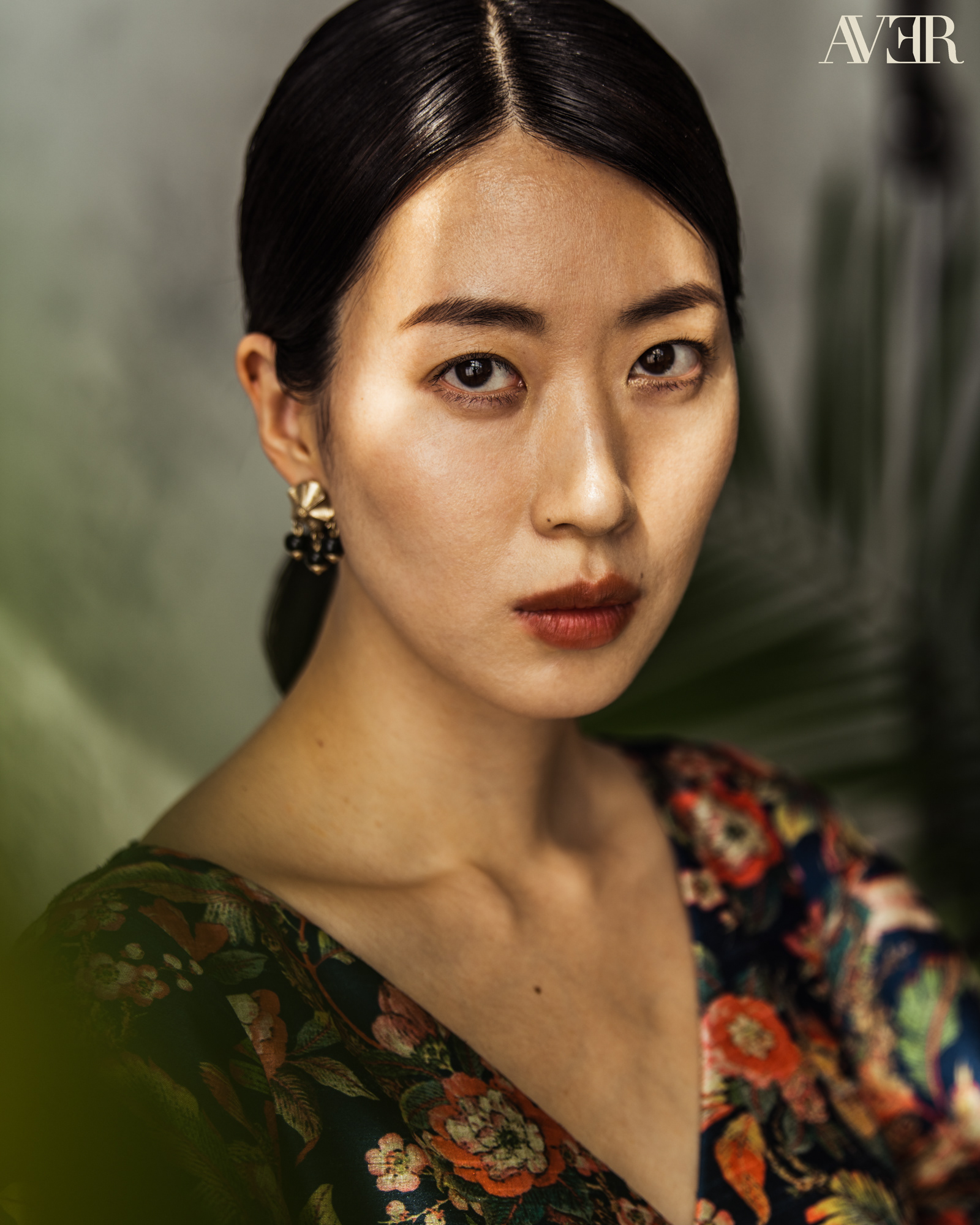 Jiyoung Chang face in front of ferns