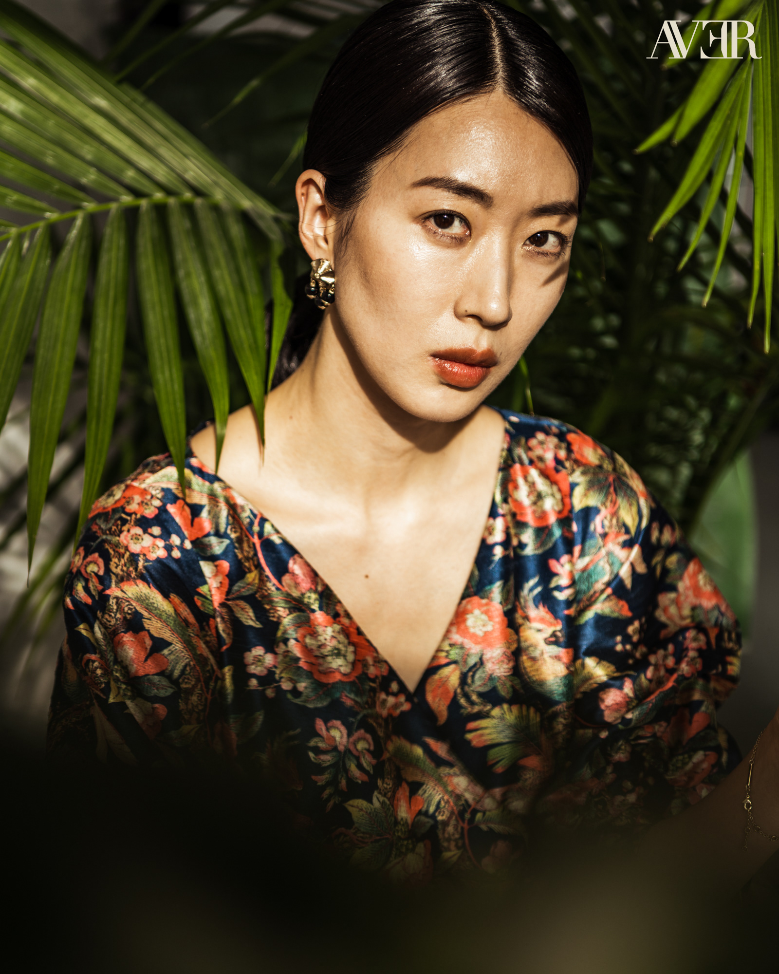 Jiyoung Chang with palm leaves