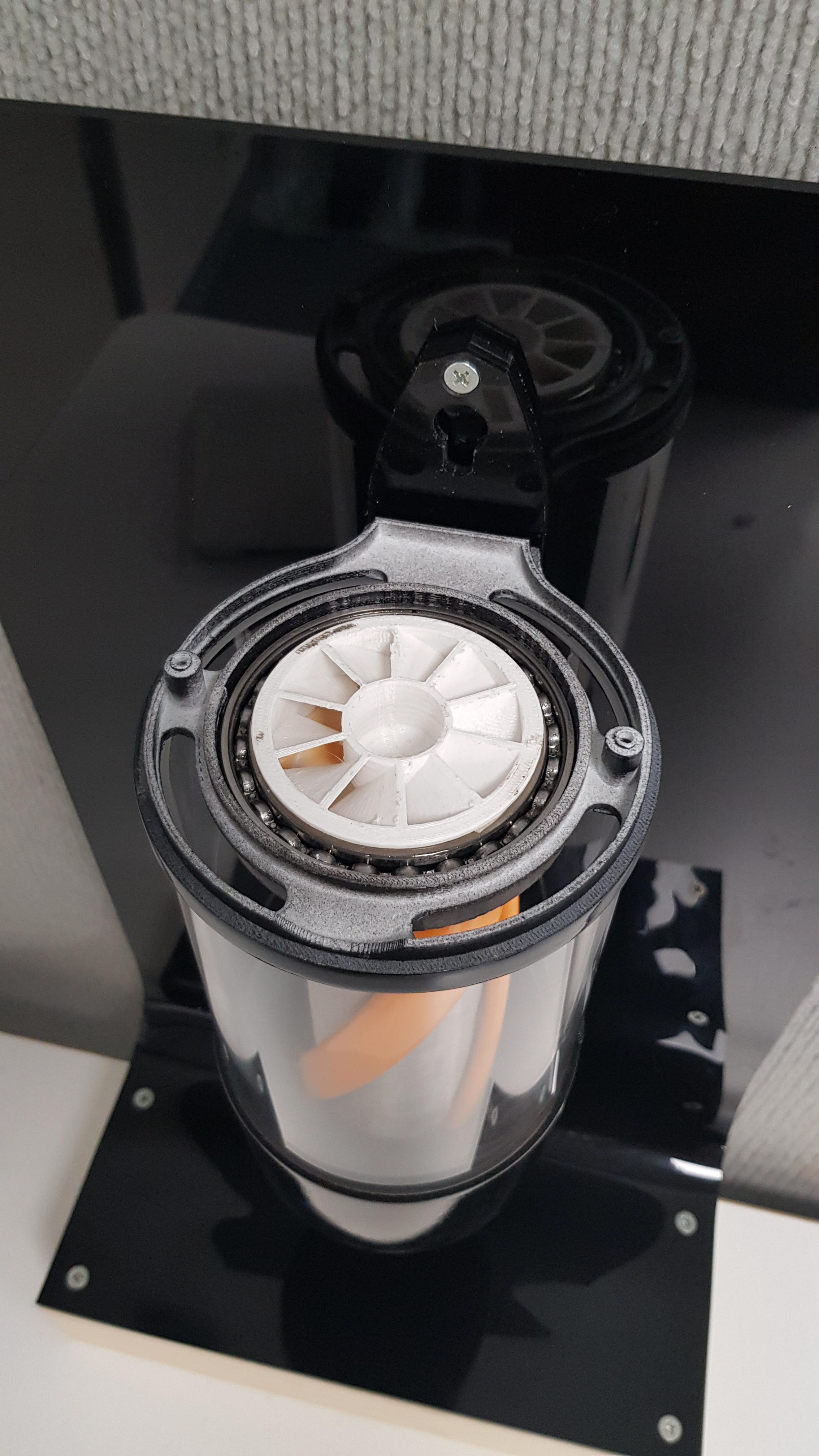 Internal view of the fan blades that imparts the spin on the cleaning mechanism.