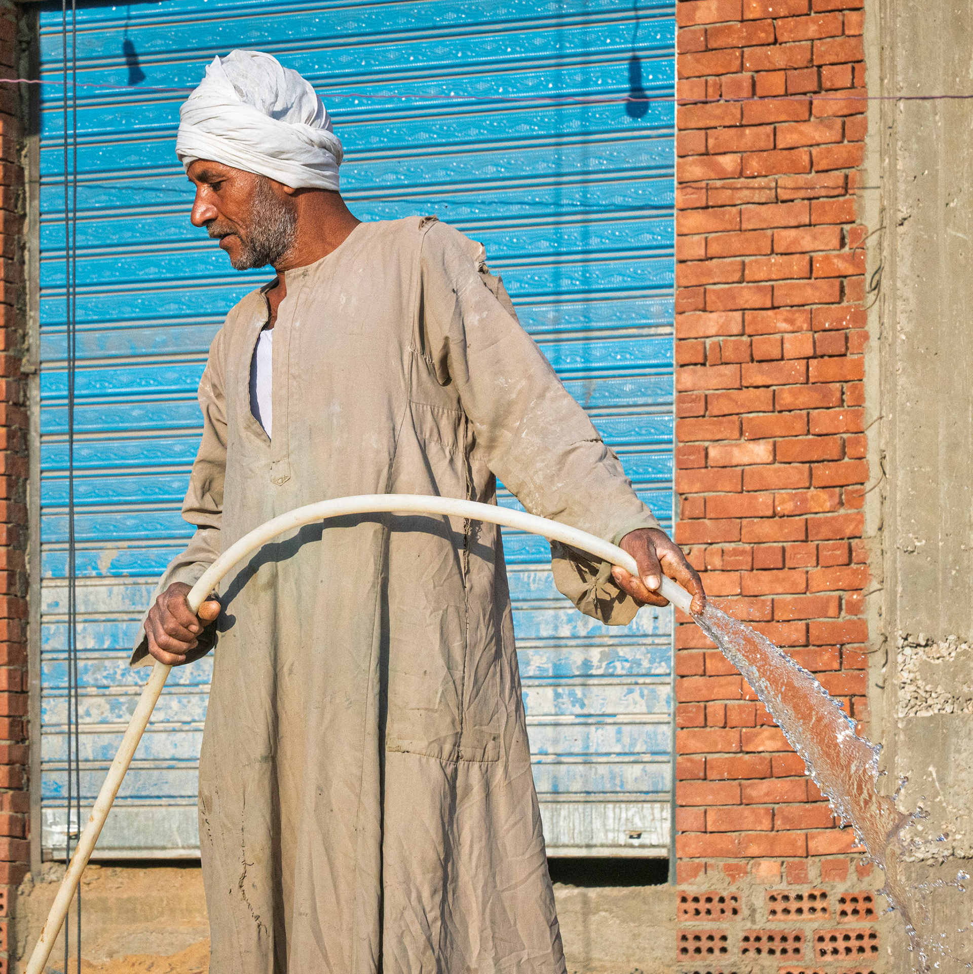 Man With Hose (2025)