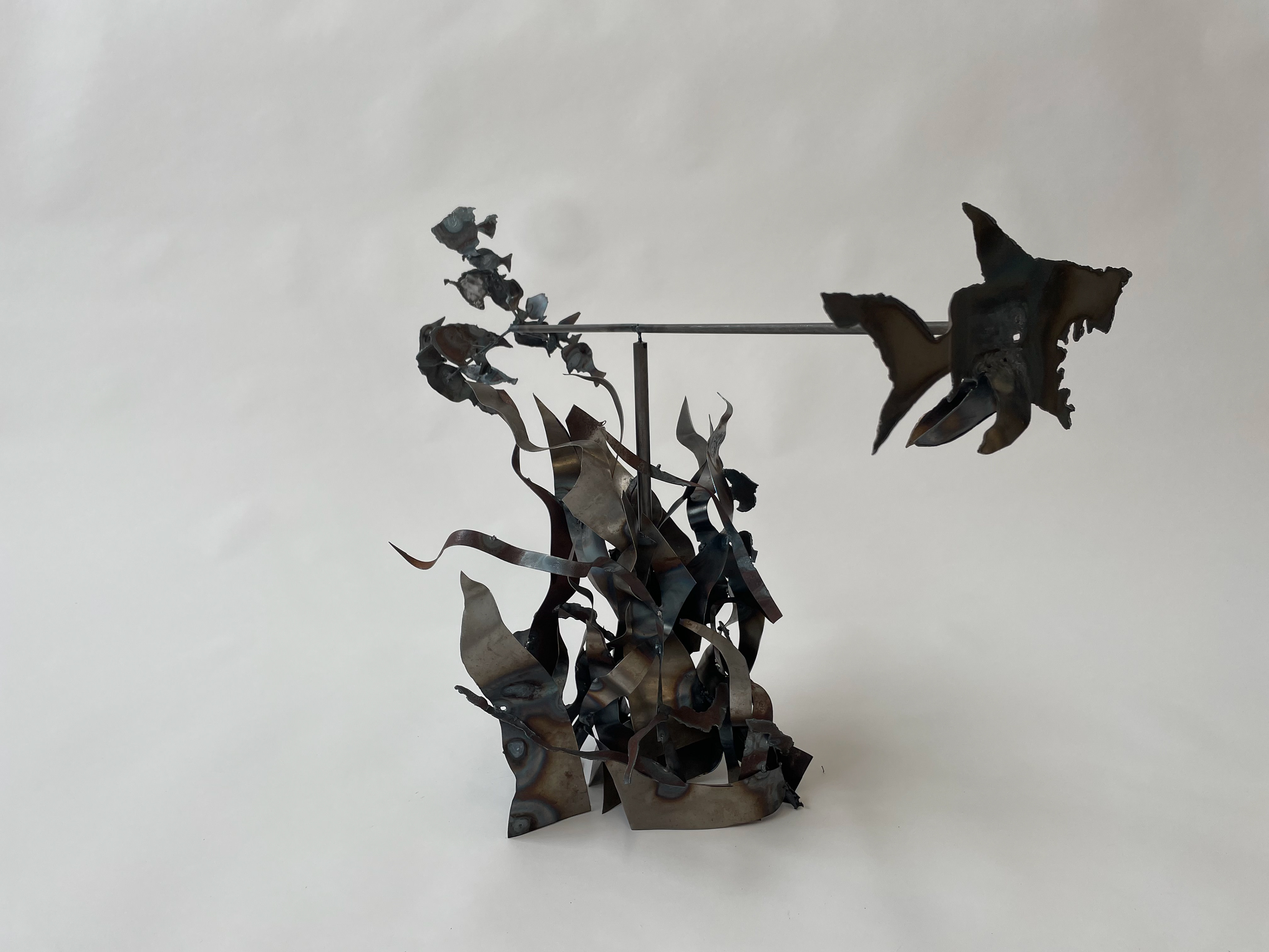 Spinning shark and fish sculpture. Welded with aluminum.