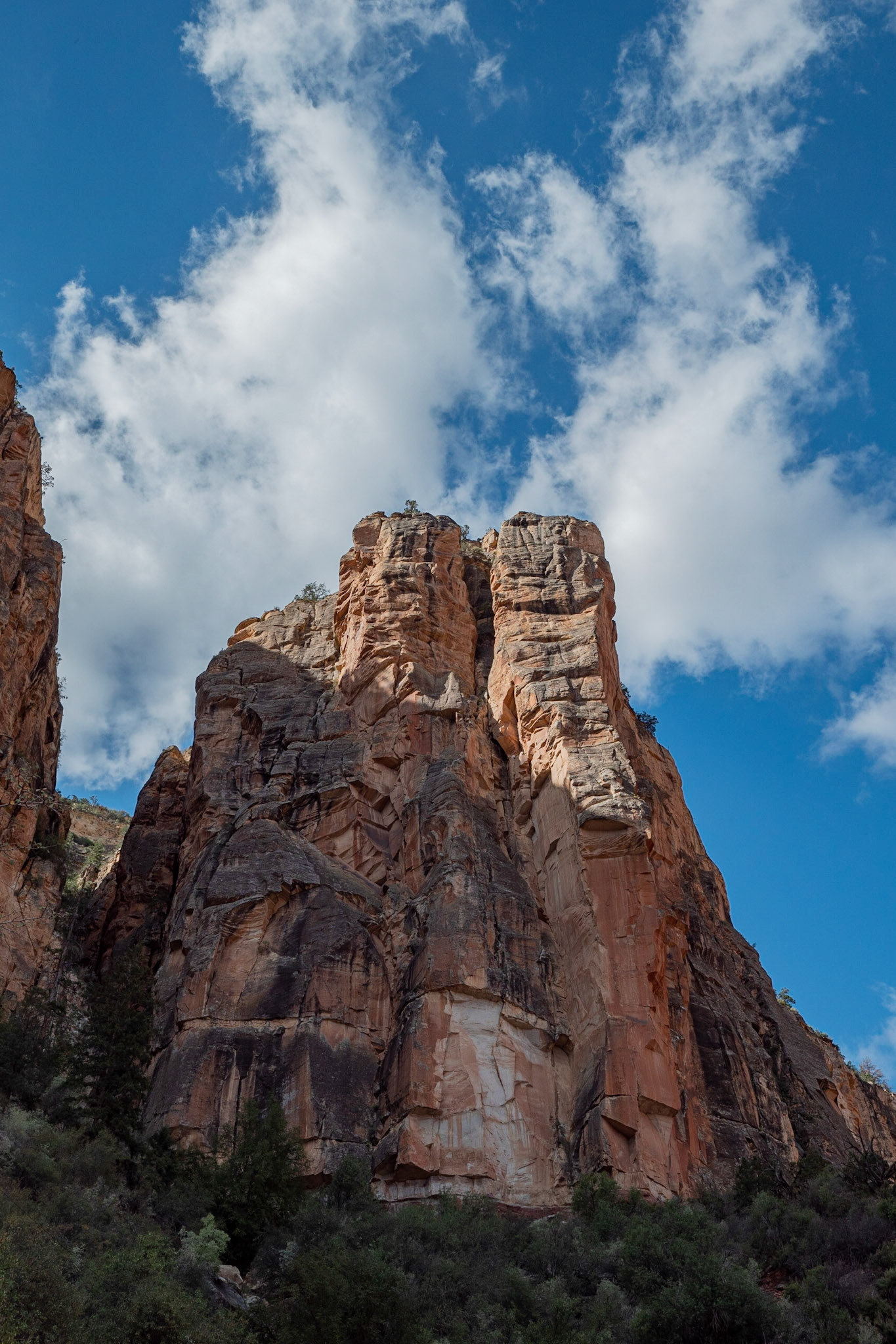 P1084547 The walls of the canyon rises to meet he clouds
