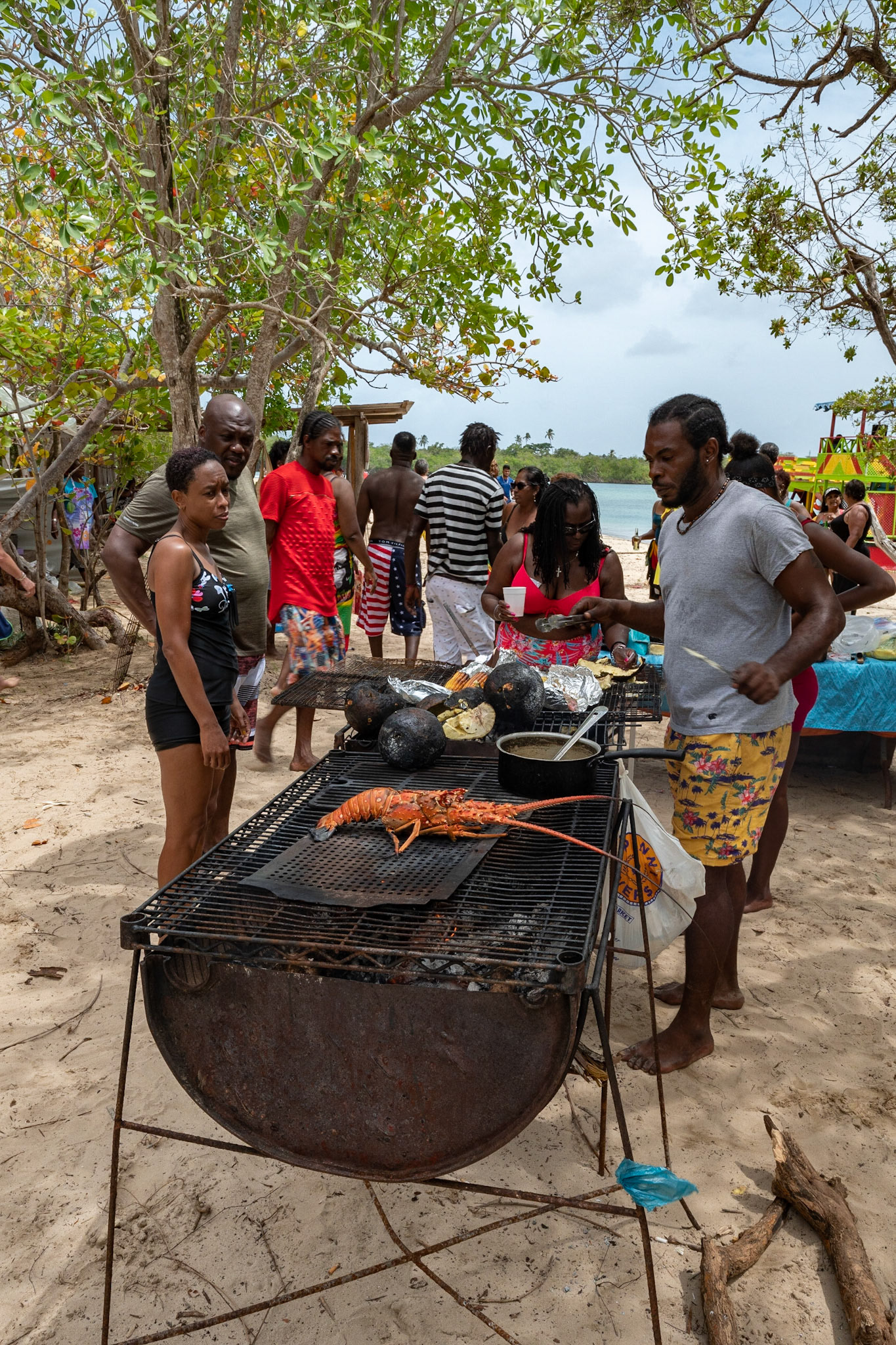 P1071381 Lunch on No Mans Land, roasted lobster with roated breadfruit, corn and plantain