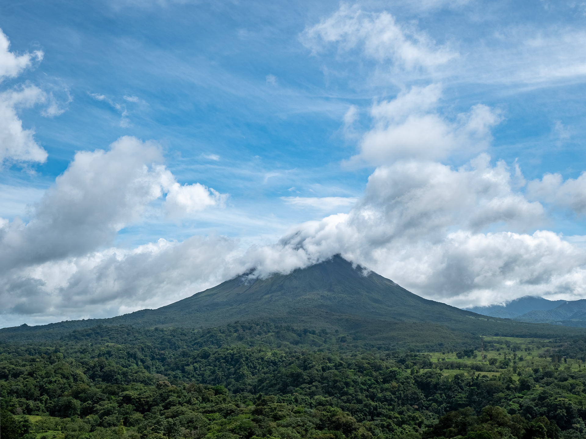 P1158157 A view of Arenal Vocano as we travel Arenal Park