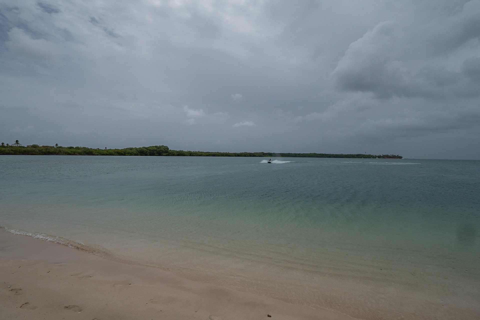 P1071354 Landed on "No mans land", jet ski approaches
