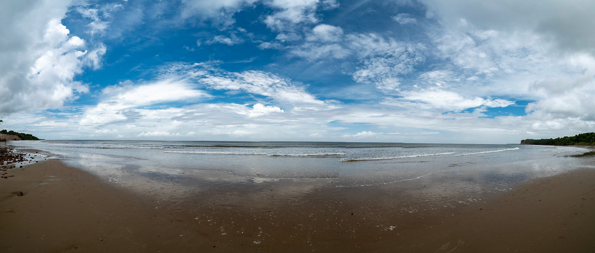 P1071637 Panoramic view of sand, sea and sky