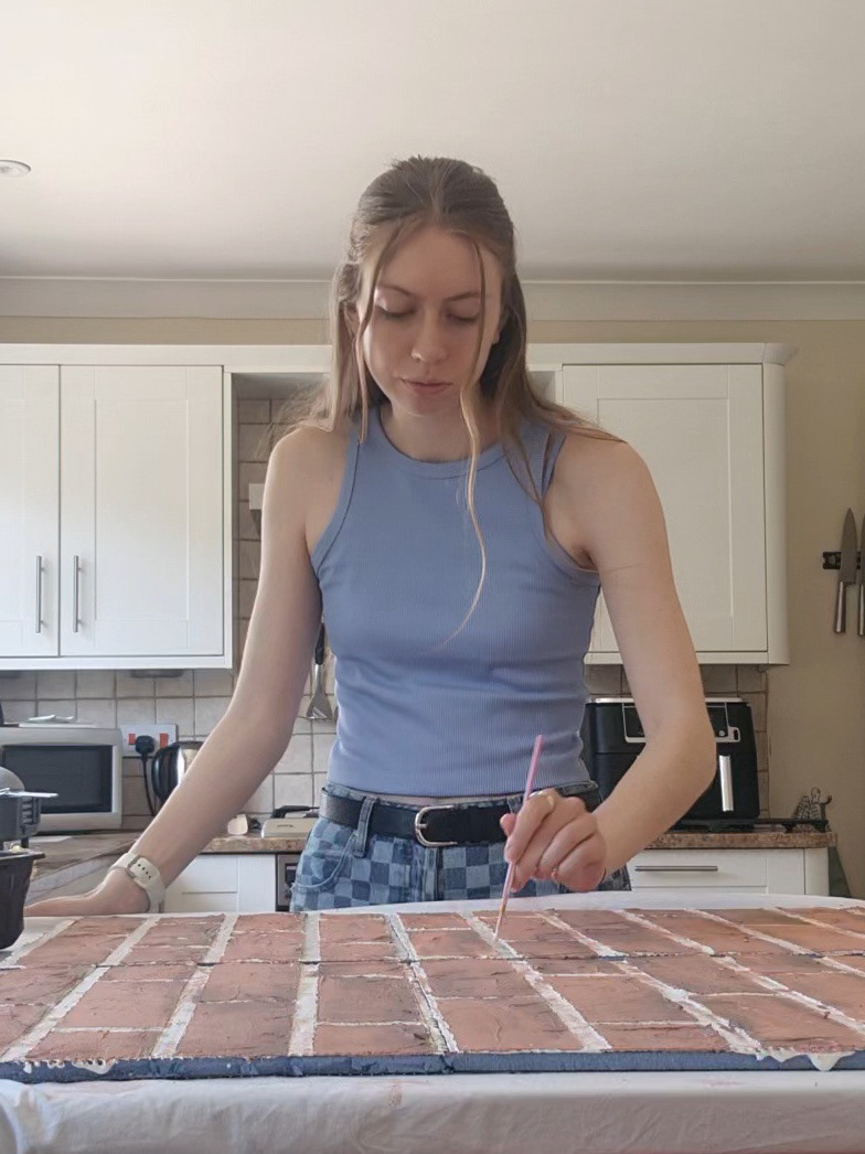 Adding depth to the bricks using darker colours
