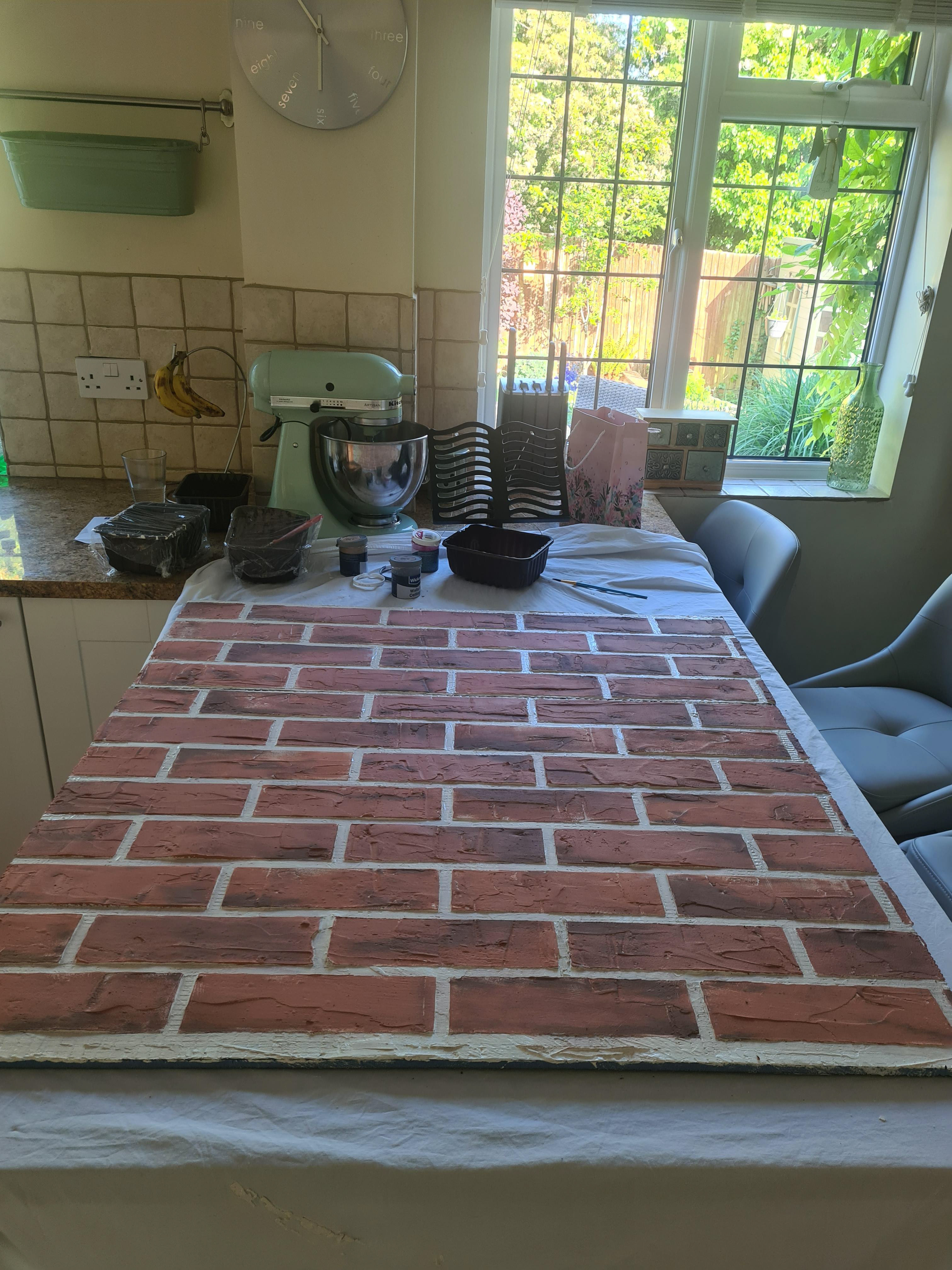 Cleaning up the and painting the 'cement'