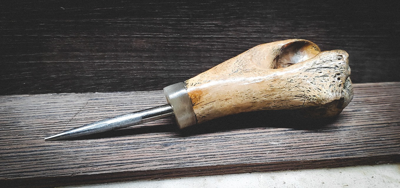 Ancient Seal bone and musk ox horn cigar nub holder