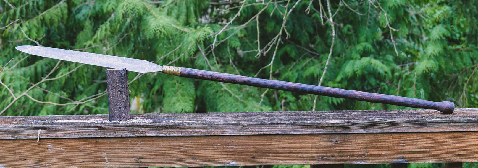 Iklwa spear. 50 inches oal, 17" blade.. 1075 steel, ash, and brass