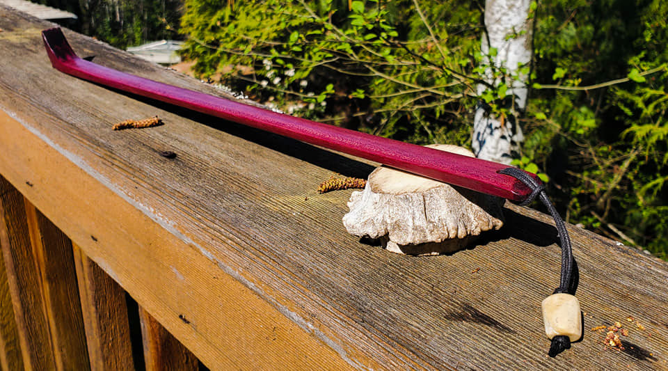 Purpleheart backscratcher with walrus ivory bead