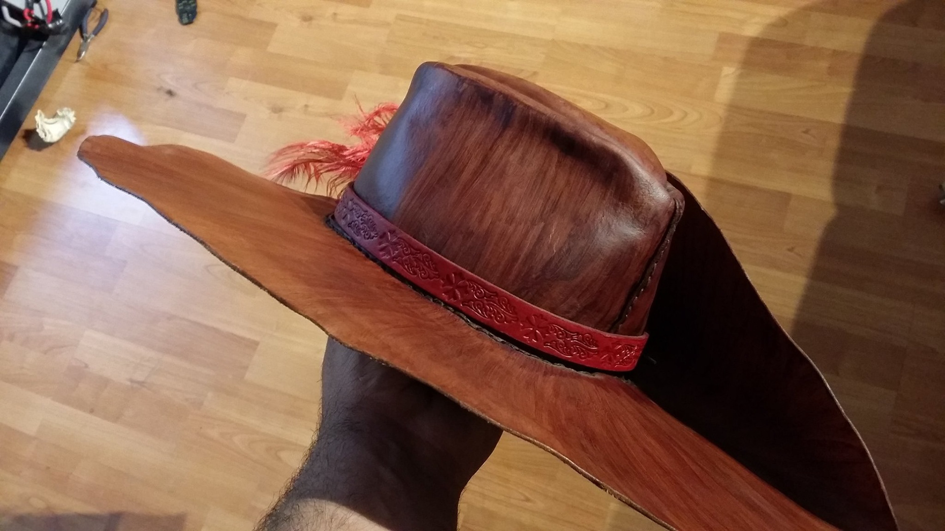 leather cavalier hat with tooled leather band