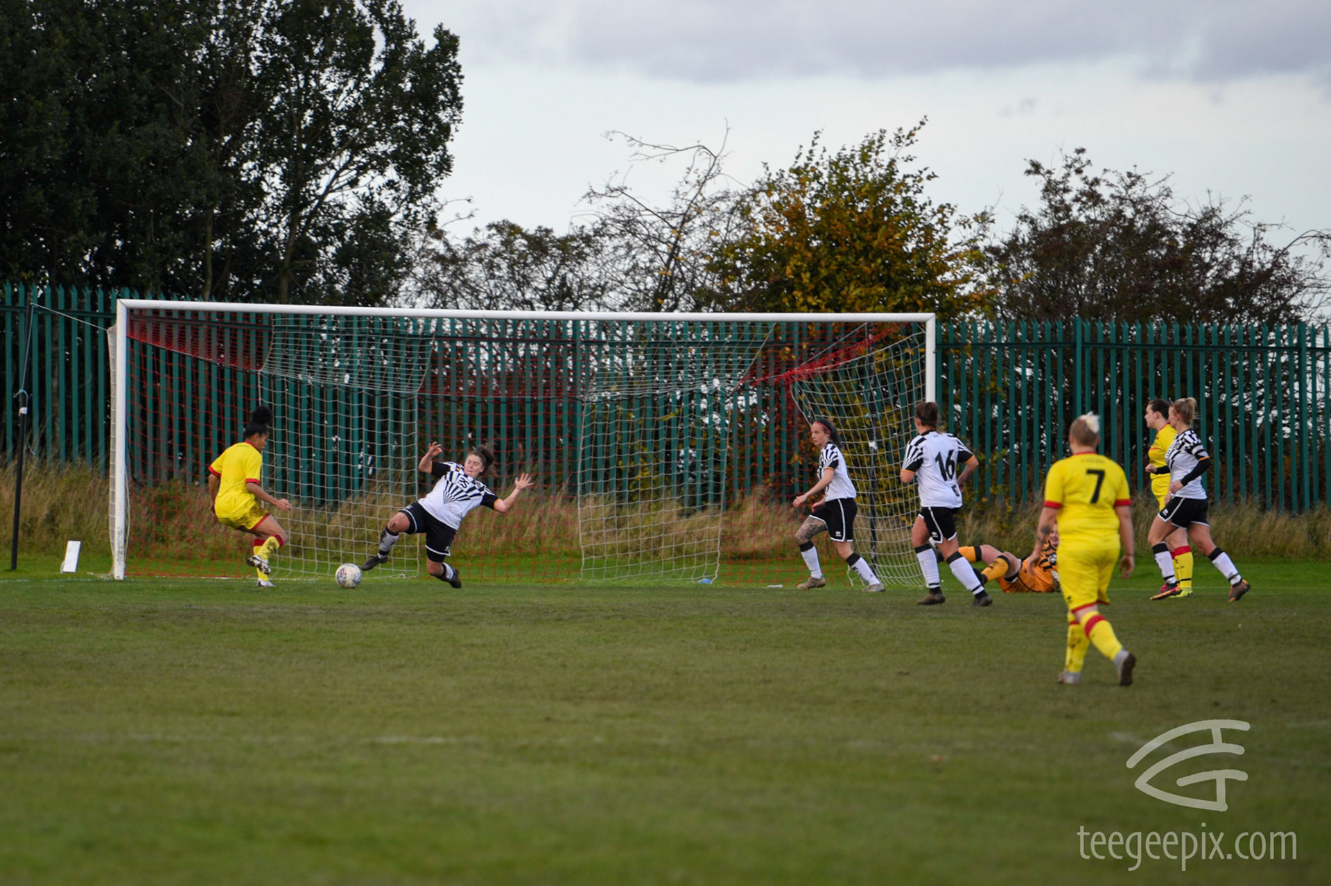 Olivia Brookes wins the ball to prevent Walsall scoring