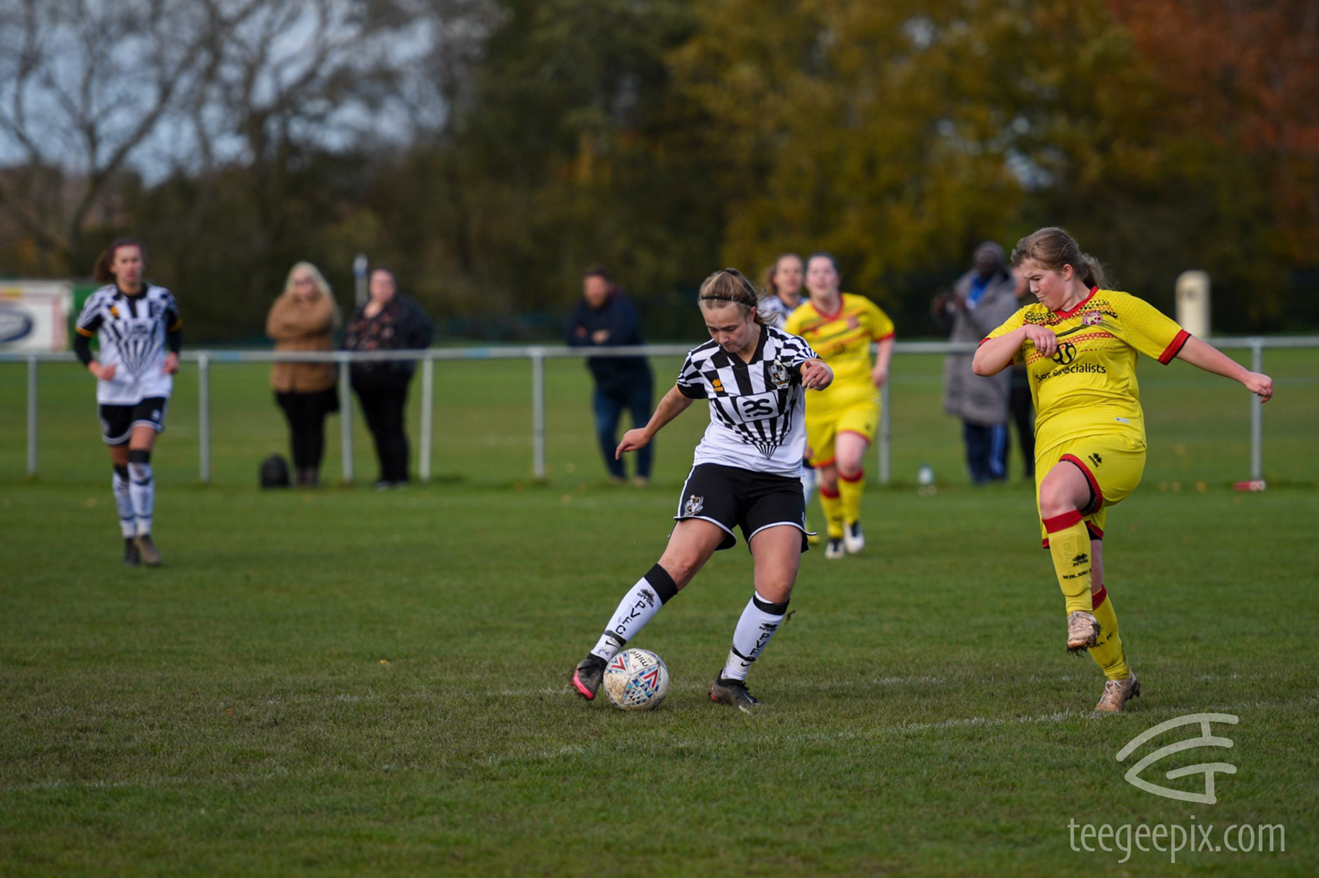 Hollie Edwards lines up a shot but the offside flag has been raised